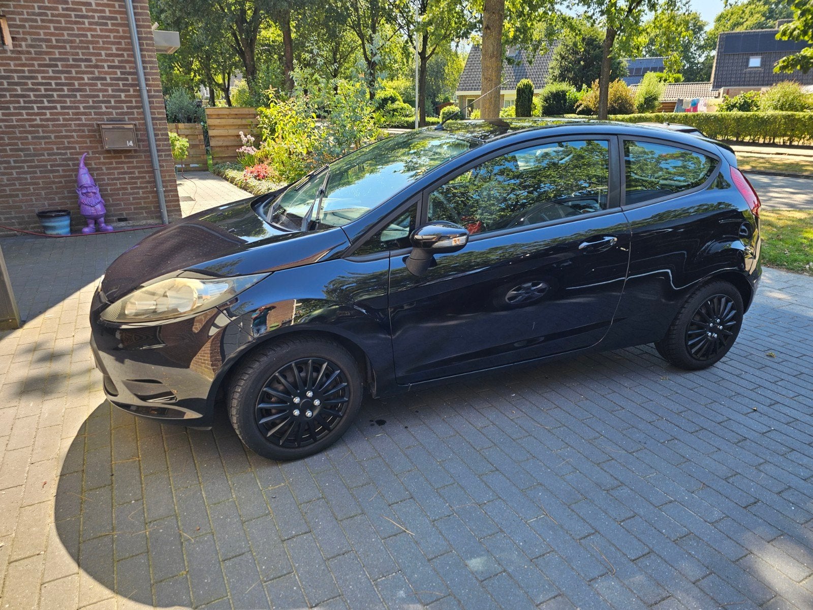 Ford Fiësta 1.25 44KW 3DR 2009 Zwart, Auto's, Ford, Voorwielaandrijving, 4 cilinders, Zwart, Bedrijf
