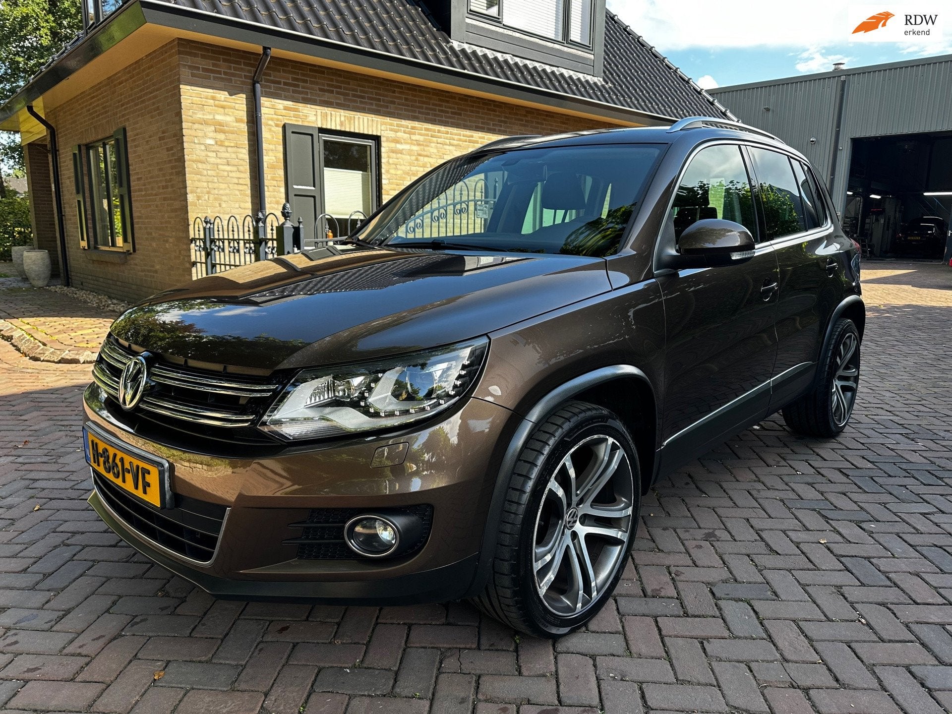 Volkswagen Tiguan 1.4 TSI Sport&Style 4Motion, Auto's, 13 km/l, Euro 5, Automatische klimaatregeling, Gebruikt