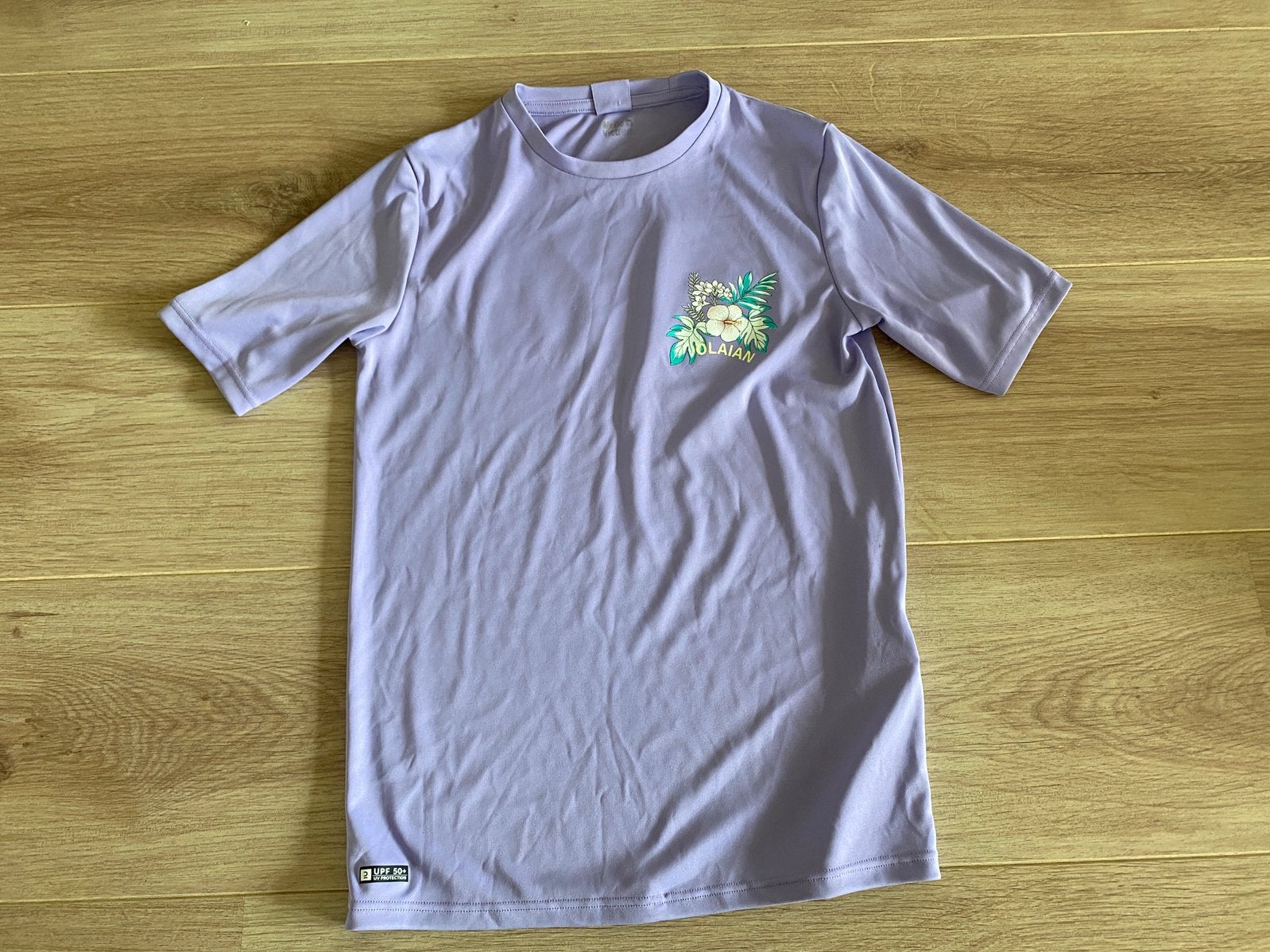 Decathlon paars UV-shirt Hibiscus 141-150 cm 10-11 jaar, Ophalen of Verzenden, Zo goed als nieuw, Overig, UV-zwemkleding
