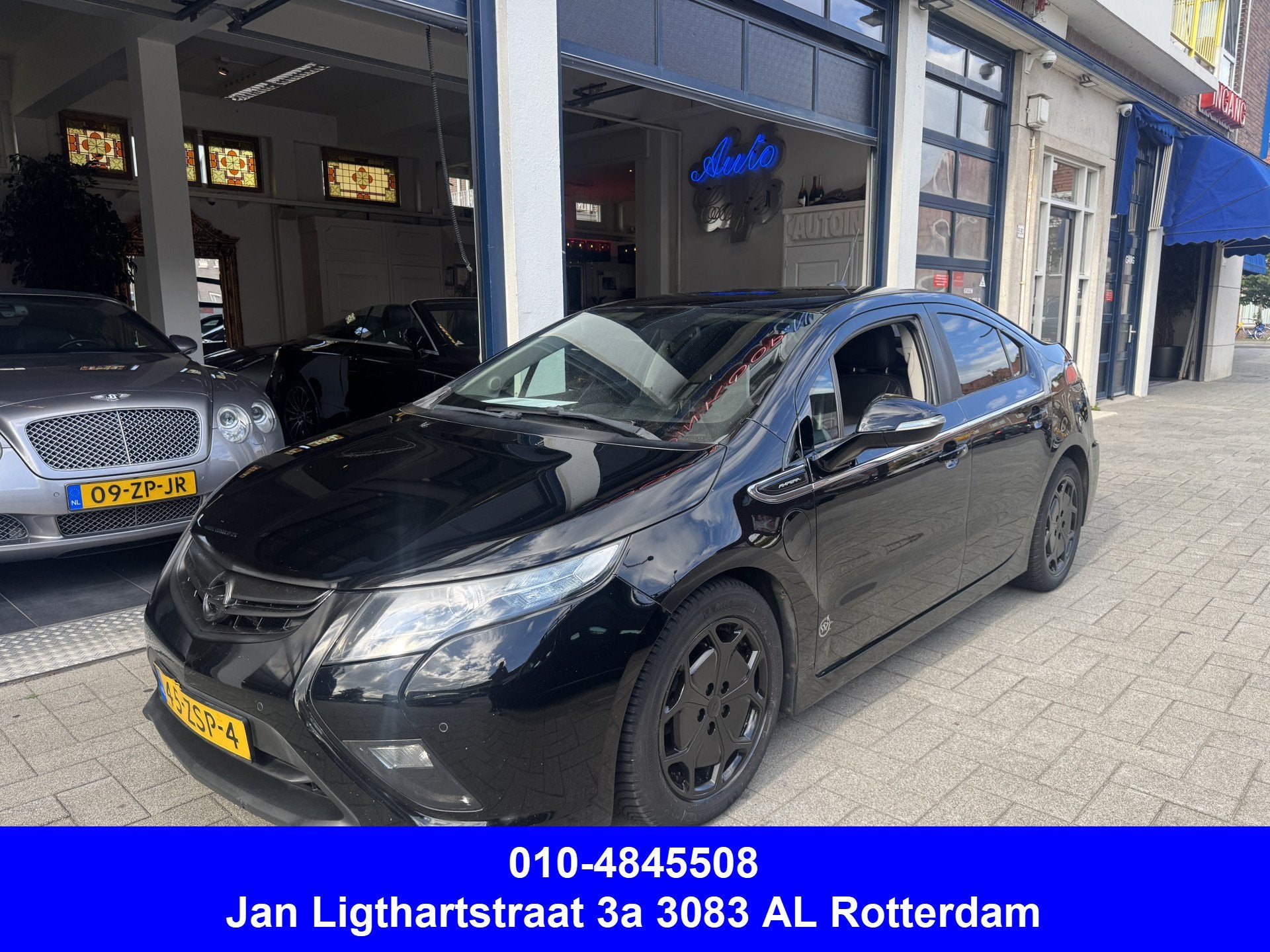 Opel Ampera 1.4 NL AUTO/LEDER/CLIMA/CAMERA/BOSE (bj 2013), Auto's, Euro 5, 1398 cc, 4 cilinders, 4 stoelen