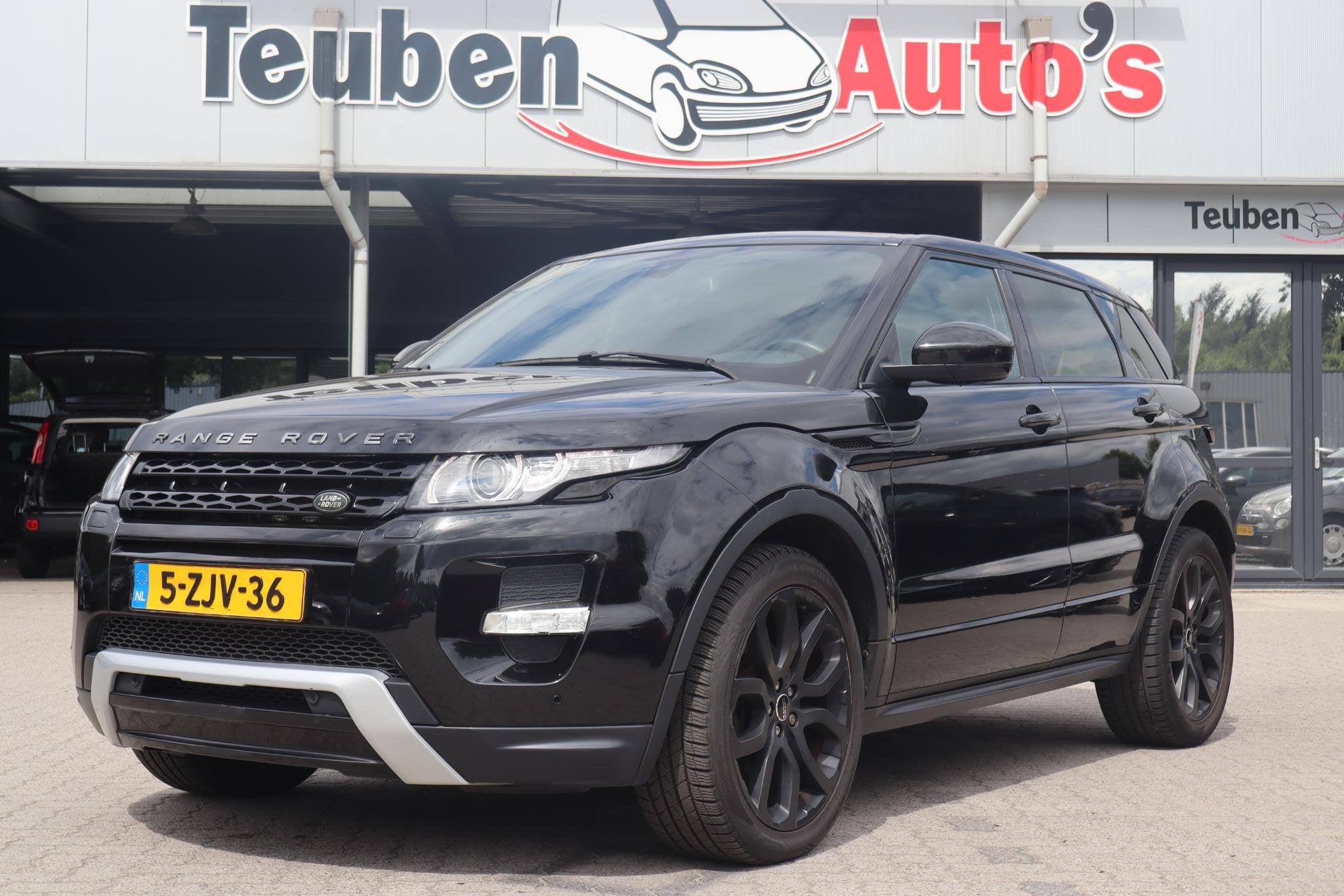 Land Rover Range Rover Evoque 2.0 Si 4WD Prestige | Automaat, Auto's, Euro 5, Zwart, 4 cilinders, Zwart