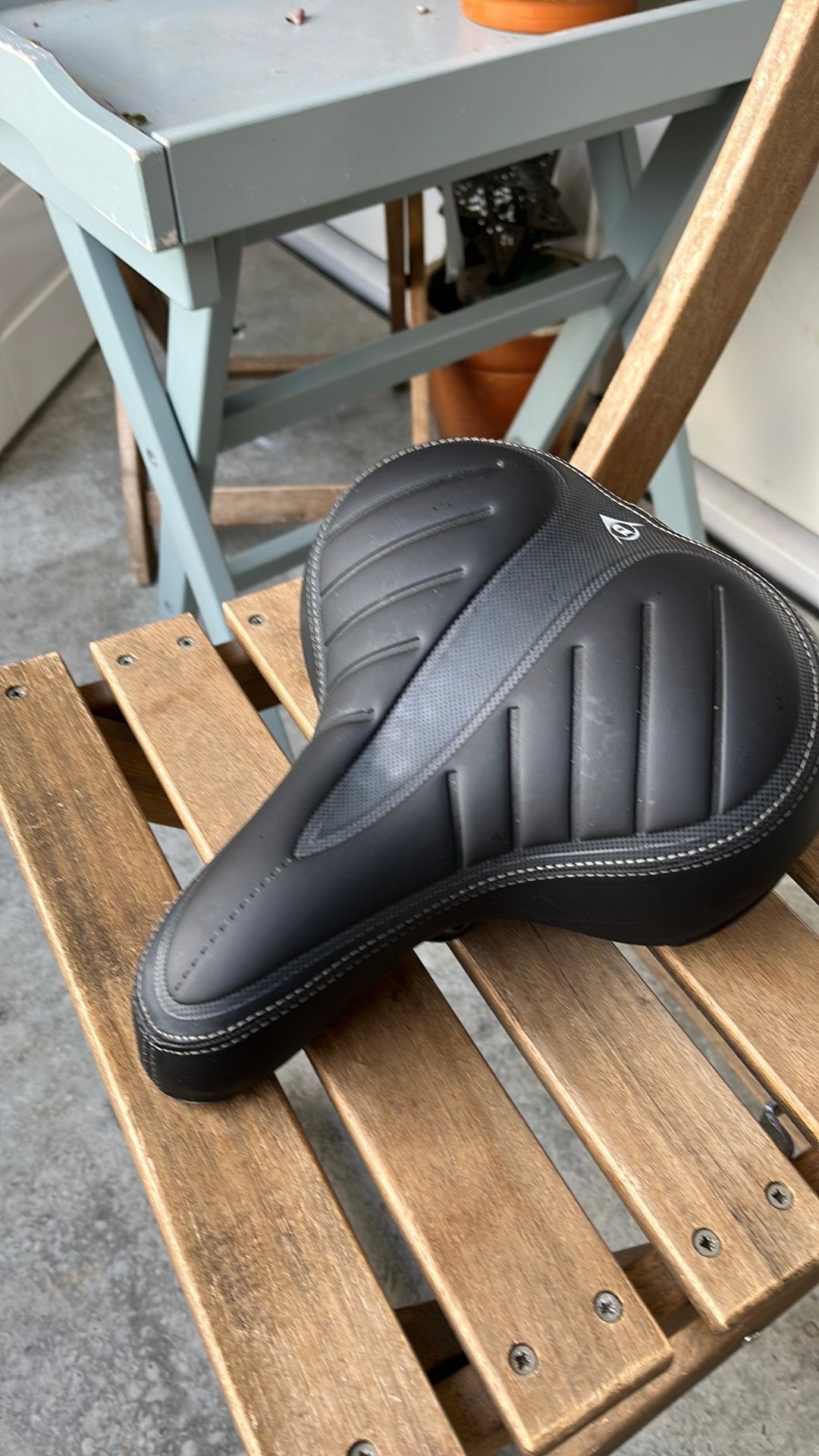 Dunlop fietszadel zgan, Ophalen