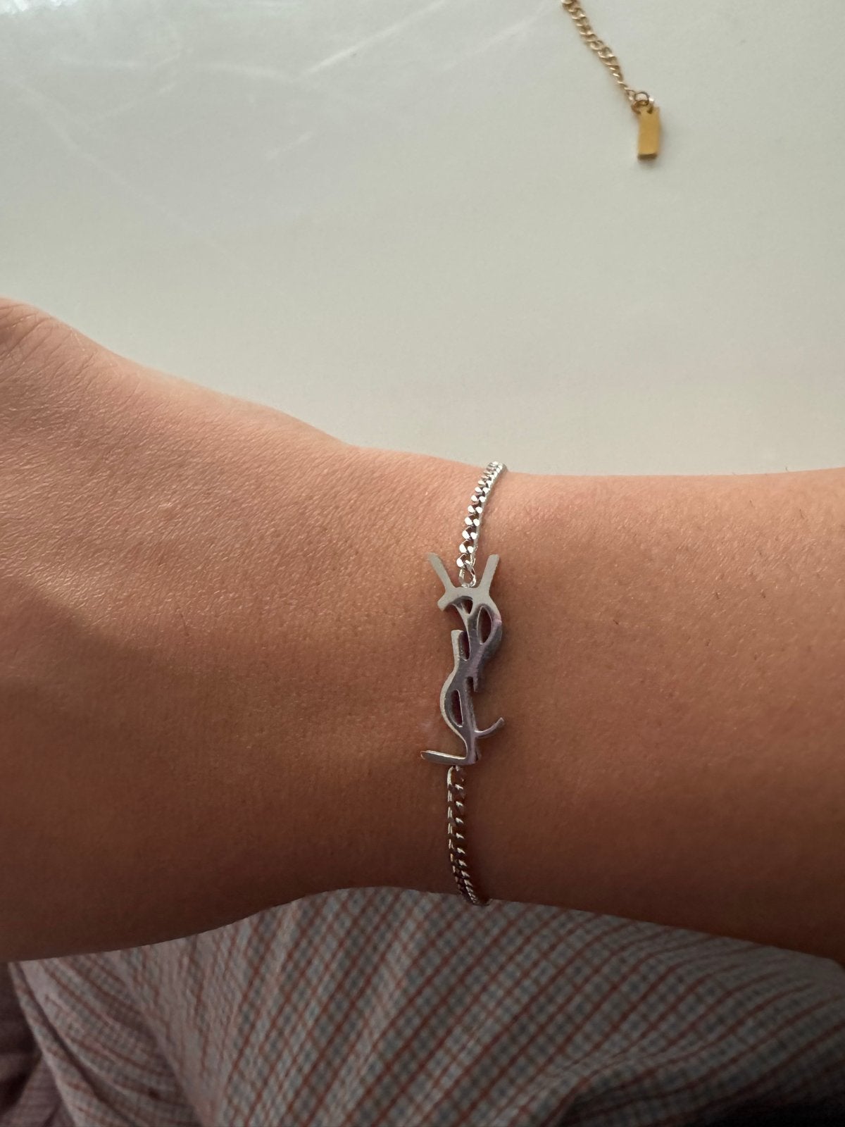 Saint laurent Stijlvolle Zilverkleurige Armband, Sieraden, Tassen en Uiterlijk, Armbanden, Ophalen of Verzenden, Zo goed als nieuw