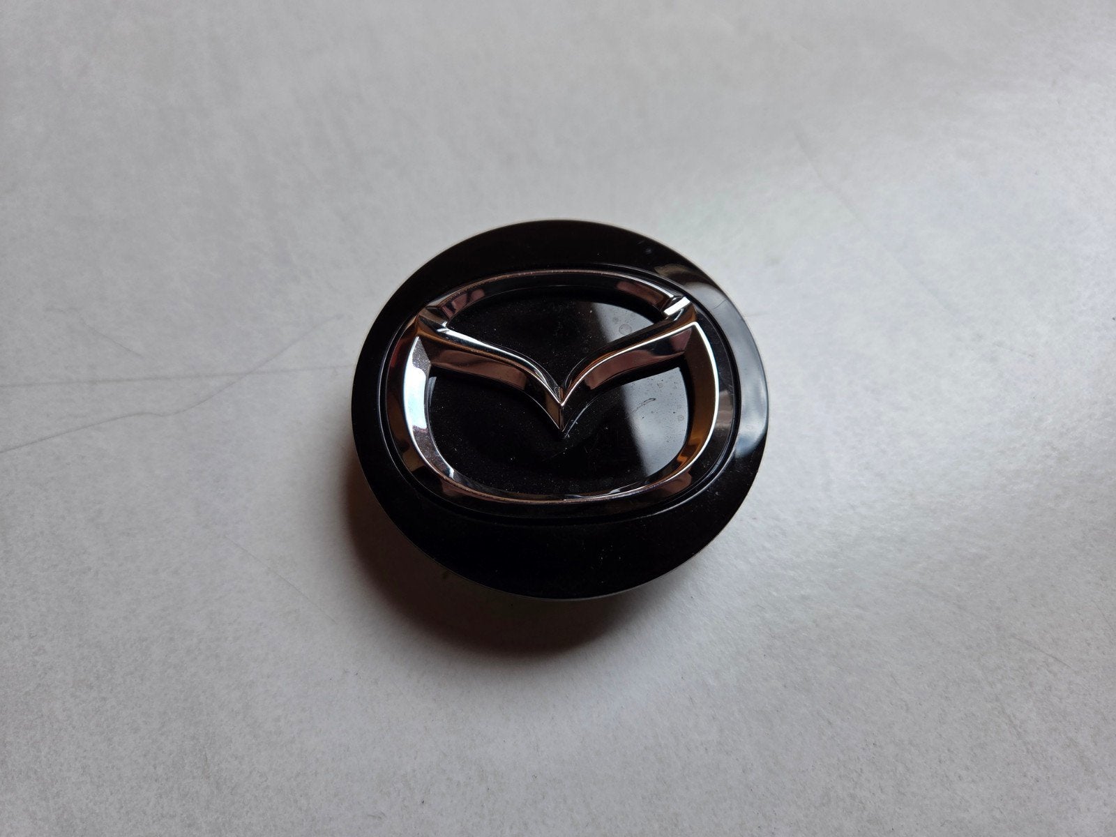 Mazda naafdop, Auto diversen, Wieldoppen, Ophalen of Verzenden, Zo goed als nieuw
