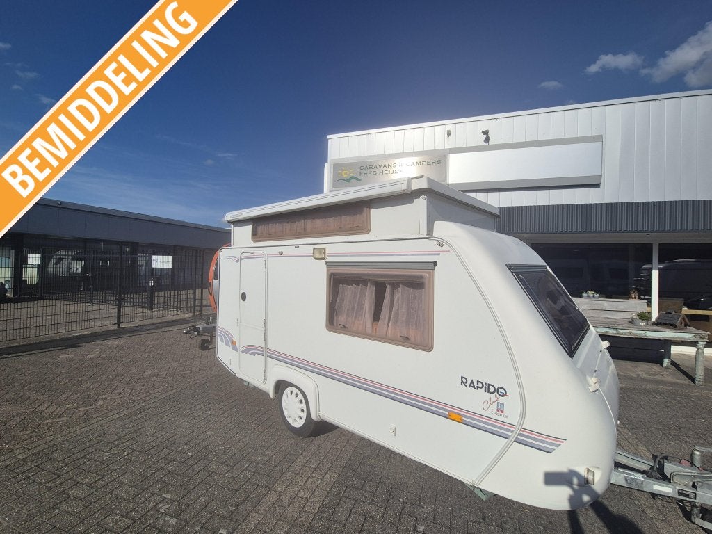 Rapido Evolution 31 TD 2001 luifel vast, fietsenrek 6950,-, Overige typen, 4 tot 5 meter, Schokbreker, 500 - 750 kg