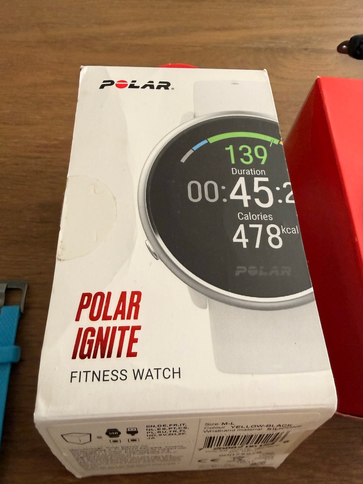 Polar Ignite sporthorloge met oplader en 10 bandjes, Gebruikt, Hartslag, Zwart, Ophalen of Verzenden