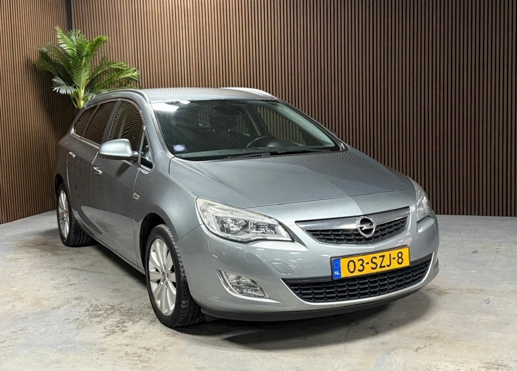 Opel Astra Sports Tourer 1.4 Turbo Cosmo (bj 2011), Auto's, Voorwielaandrijving, Gebruikt, 4 cilinders, 1337 kg