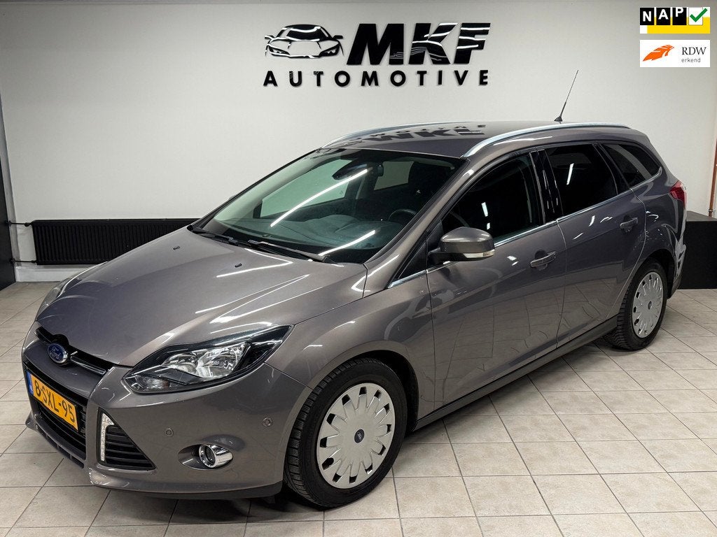 Ford Focus Wagon 1.6 TDCI ECOnetic Lease Titanium ECC/NAVI!, Auto's, Euro 5, Gebruikt, 4 cilinders, Bruin