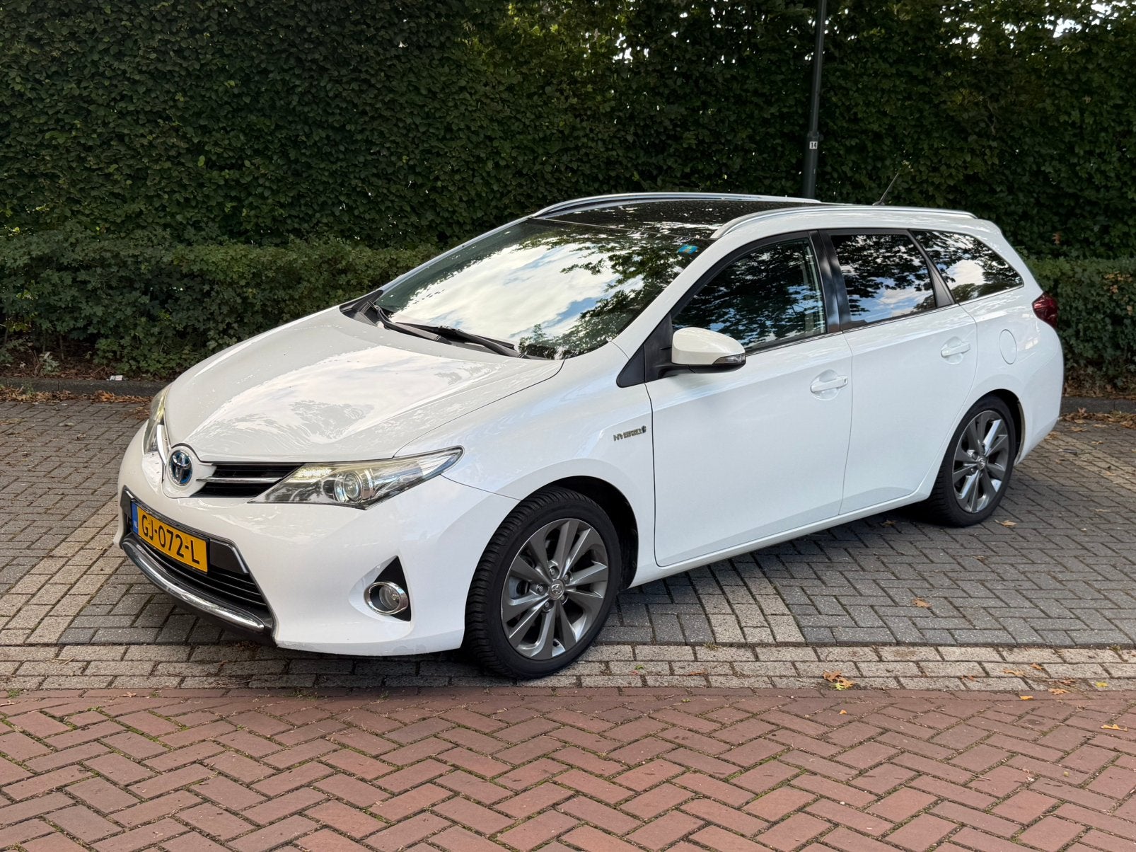 Toyota Auris 1.8 Hybrid Touring Sports CVT 2013 Wit, Wit, Stationwagon, 25 km/l, Auris
