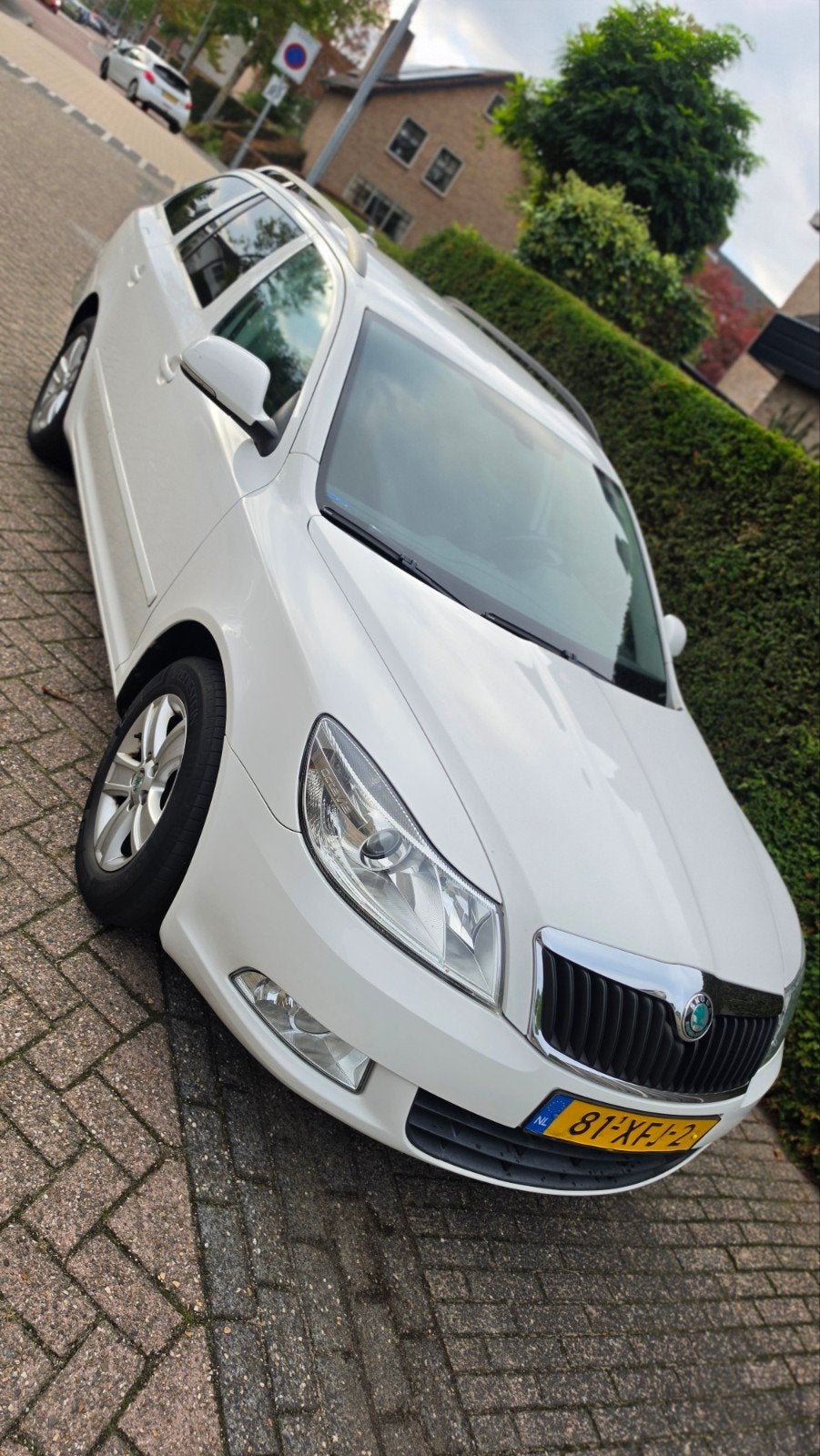 Skoda Octavia 1.2 TSI Combi 2012 Wit, Auto's, Voorwielaandrijving, 4 cilinders, Wit, Origineel Nederlands