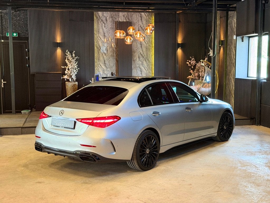 Mercedes-Benz C-klasse 300 e AMG|PANO|MEMORY|BURMESTER|FULL, Auto's, Mercedes-Benz, Automaat, Achterwielaandrijving, Euro 6, 4 cilinders