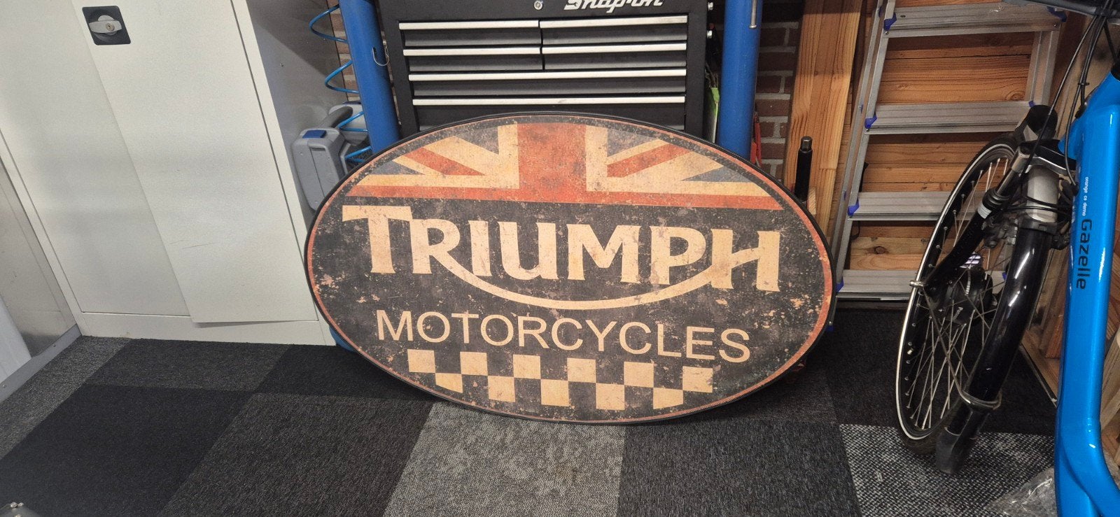 mooi wandbord van Triumph motor., Ophalen