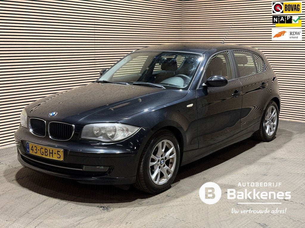 BMW 1-serie 116i Business Line | Airco | Leder, Auto's, BMW, Achterwielaandrijving, Gebruikt, 1599 cc, 4 cilinders