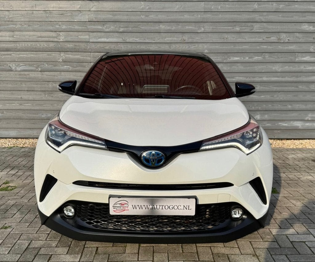 Toyota C-HR 1.8 HYBRID STYLE ULTIMATE NAVI LEDER CAMERA NAP, Auto's, 4 cilinders, Wit, 26 km/l, Hybride Elektrisch/Benzine