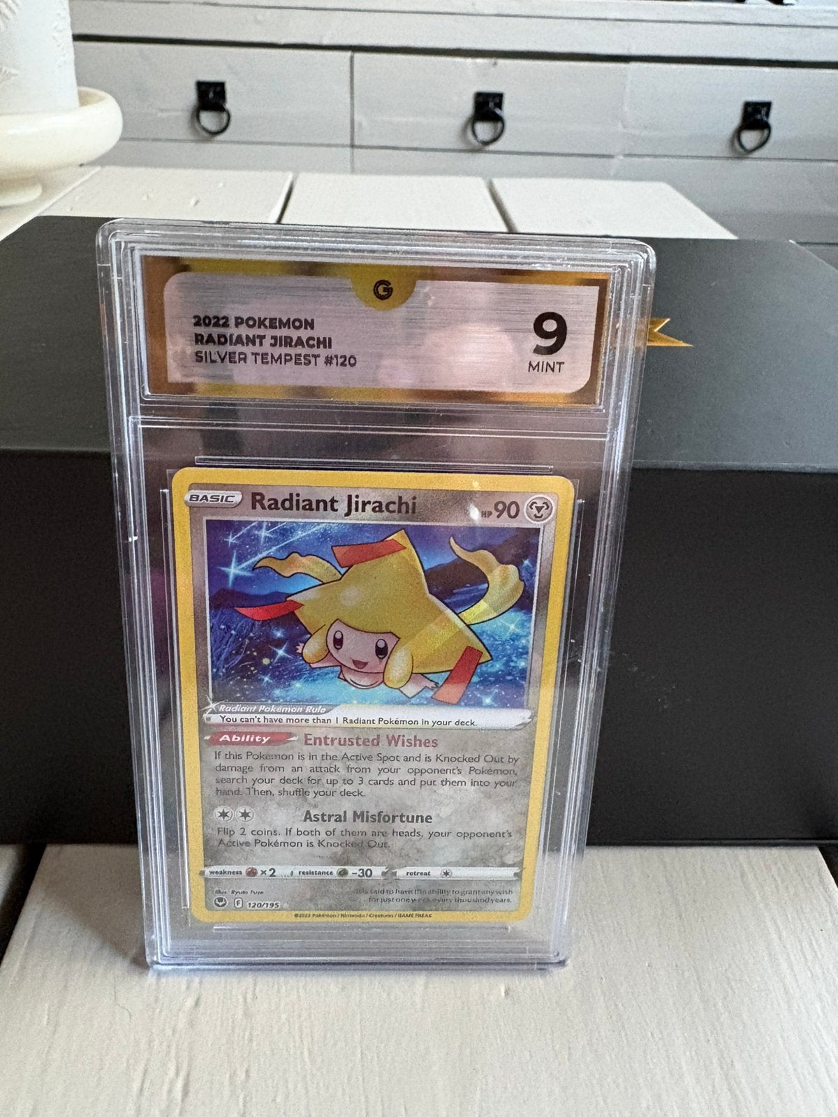 Radiant jirachi grade 9, Ophalen of Verzenden, Zo goed als nieuw, Meerdere kaarten, Foil
