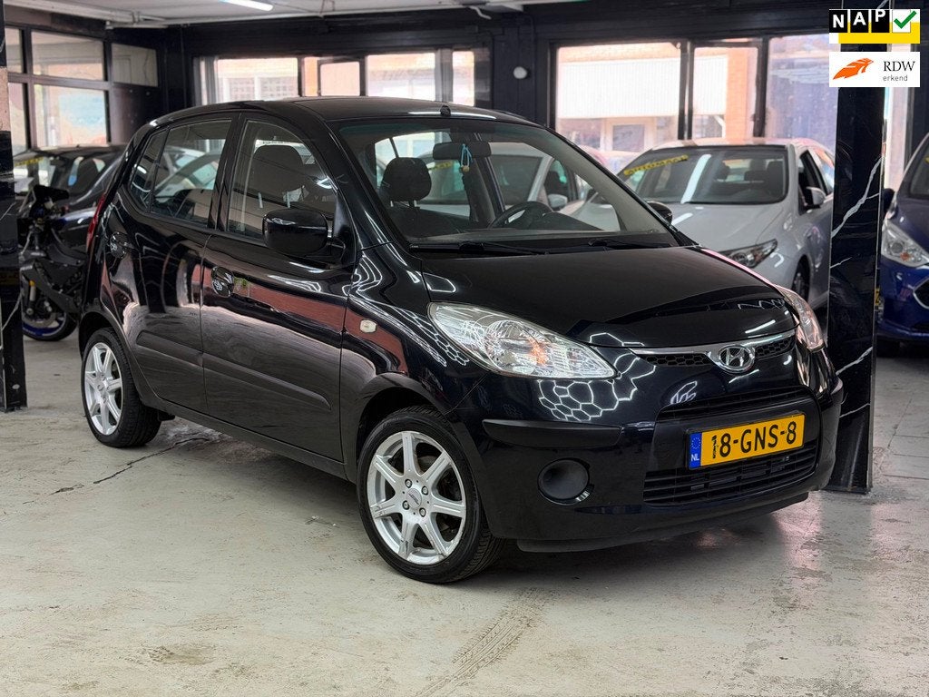 Hyundai I10 1.1 Dynamic Cool Automaat | Navi | Airco, Auto's, Hyundai, Gebruikt, 31 €/maand, 4 cilinders, Zwart