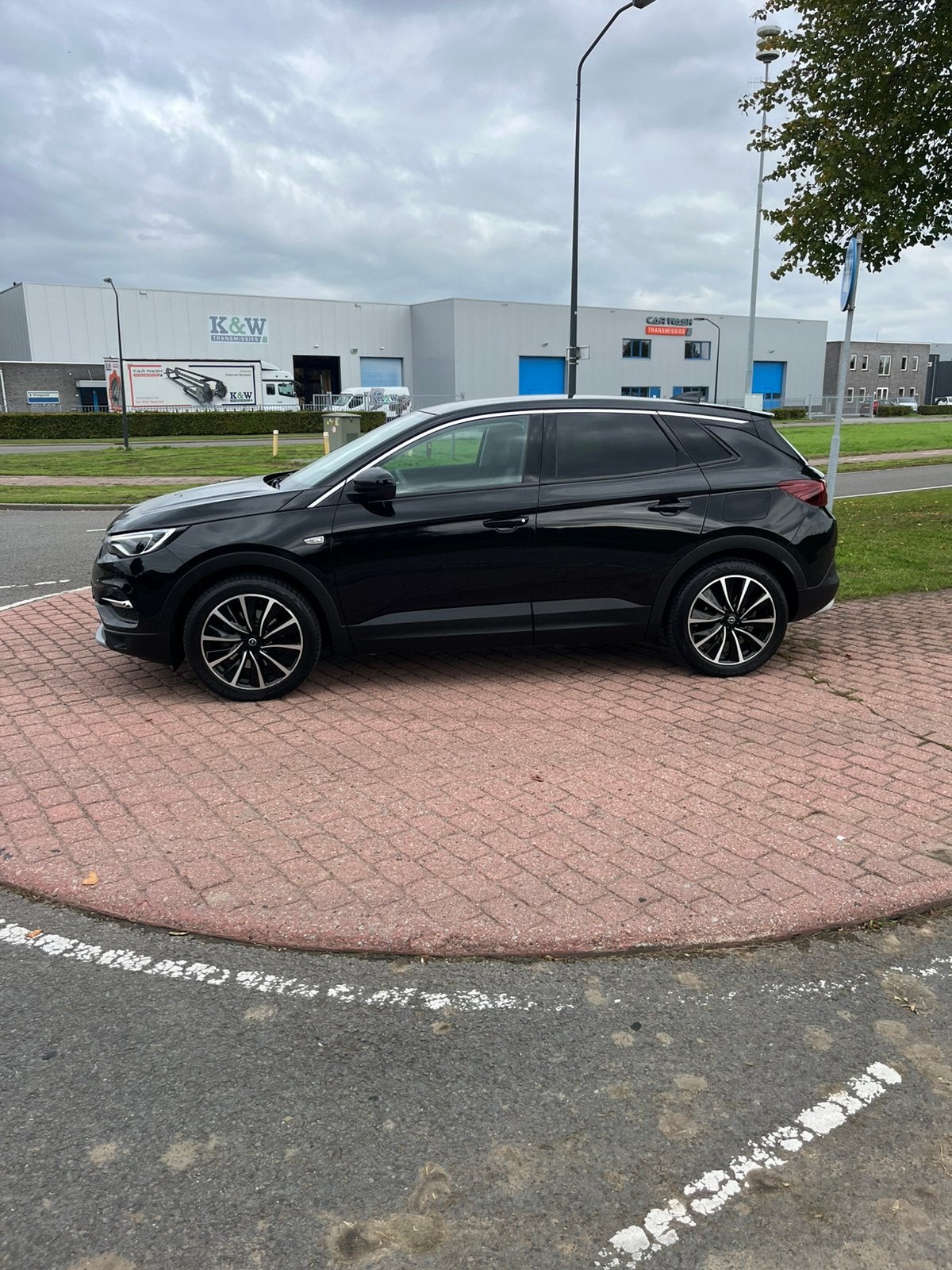 Opel Grandland X 1.6 Turbo Hybrid 225pk Aut 2020 Zwart, Auto's, Dealer onderhouden, 1250 kg, 181 pk, 1710 kg