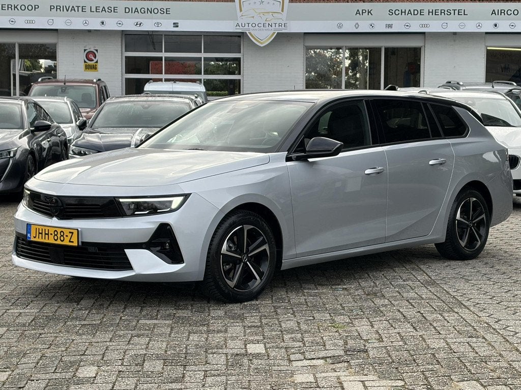 Opel Astra Sports Tourer 1.2 Turbo Hybrid GS CAMERA | KLIMA, Auto's, Opel, Gebruikt, Euro 6, 1199 cc, Hybride Elektrisch/Benzine