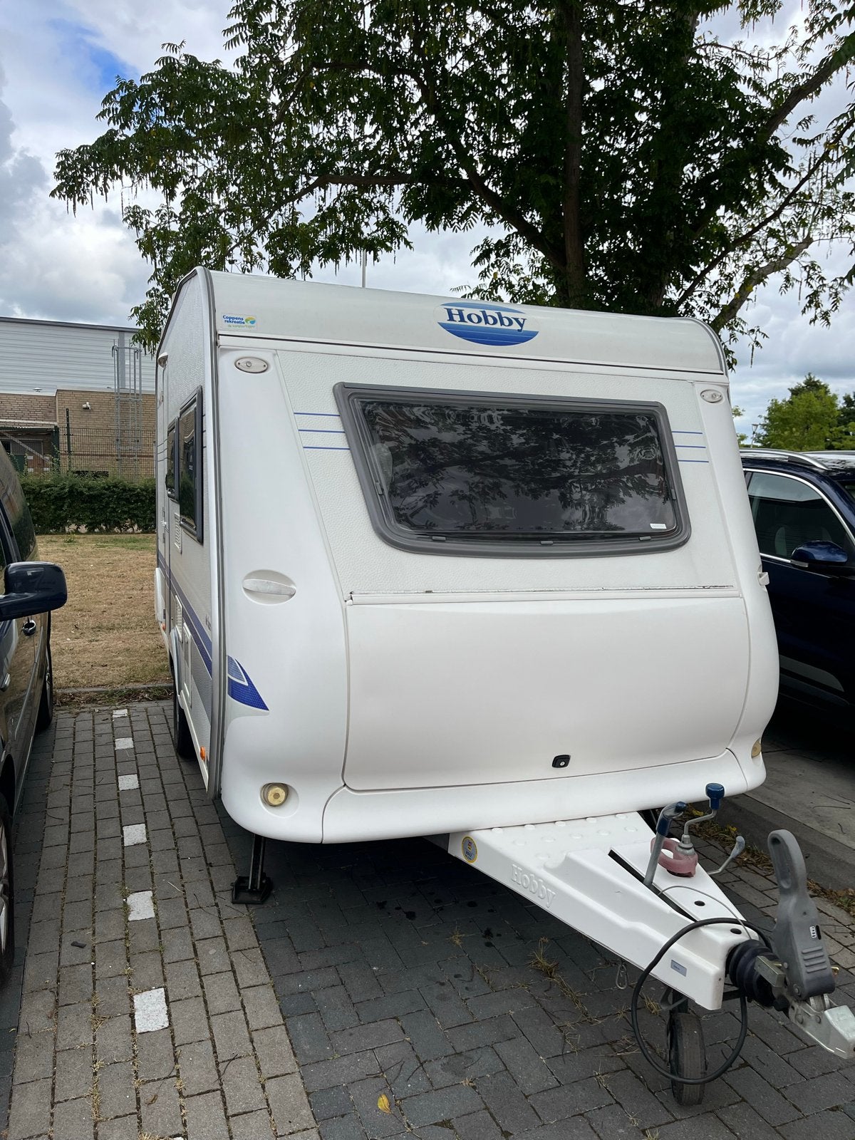 Hobby De Luxe Easy caravan met voortent en fietsenrek, Hobby, Particulier, 5 tot 6 meter, Ringverwarming