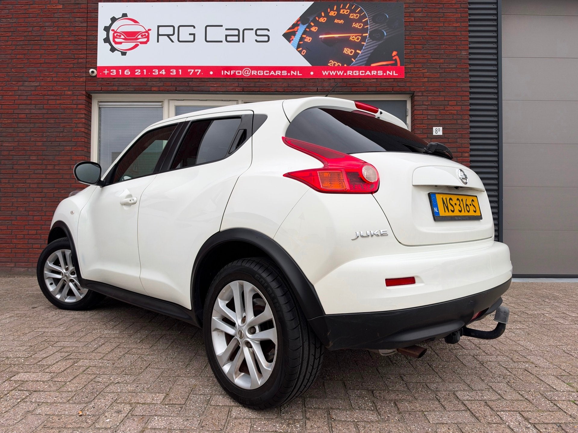 Nissan Juke 1.6 Tekna / AUT / Navi / Camera / Clima / Stoelv, Auto's, Euro 5, Stof, 4 cilinders, Met garantie (alle)