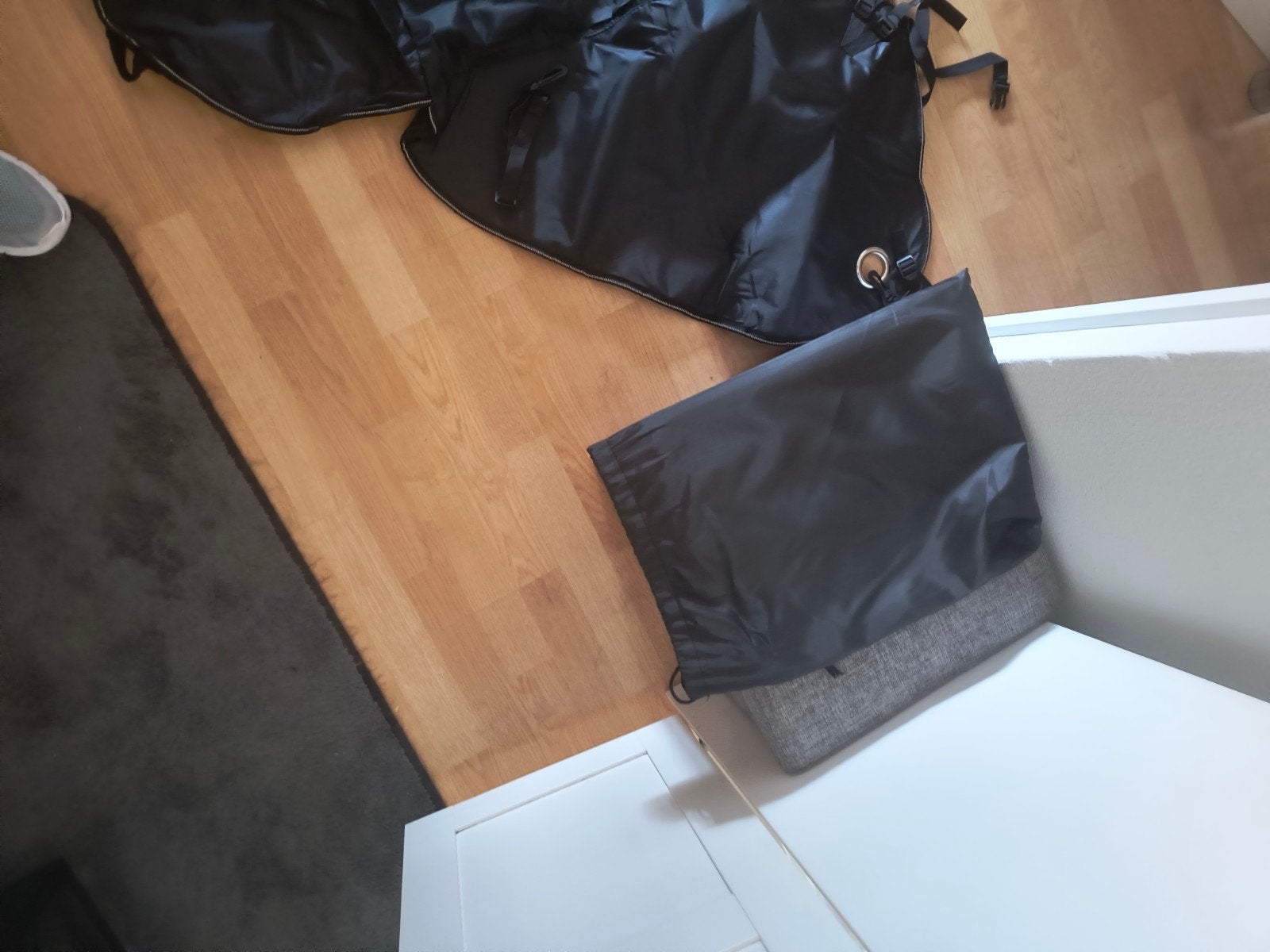 Universeel winterkleed voor de scooter, Ophalen