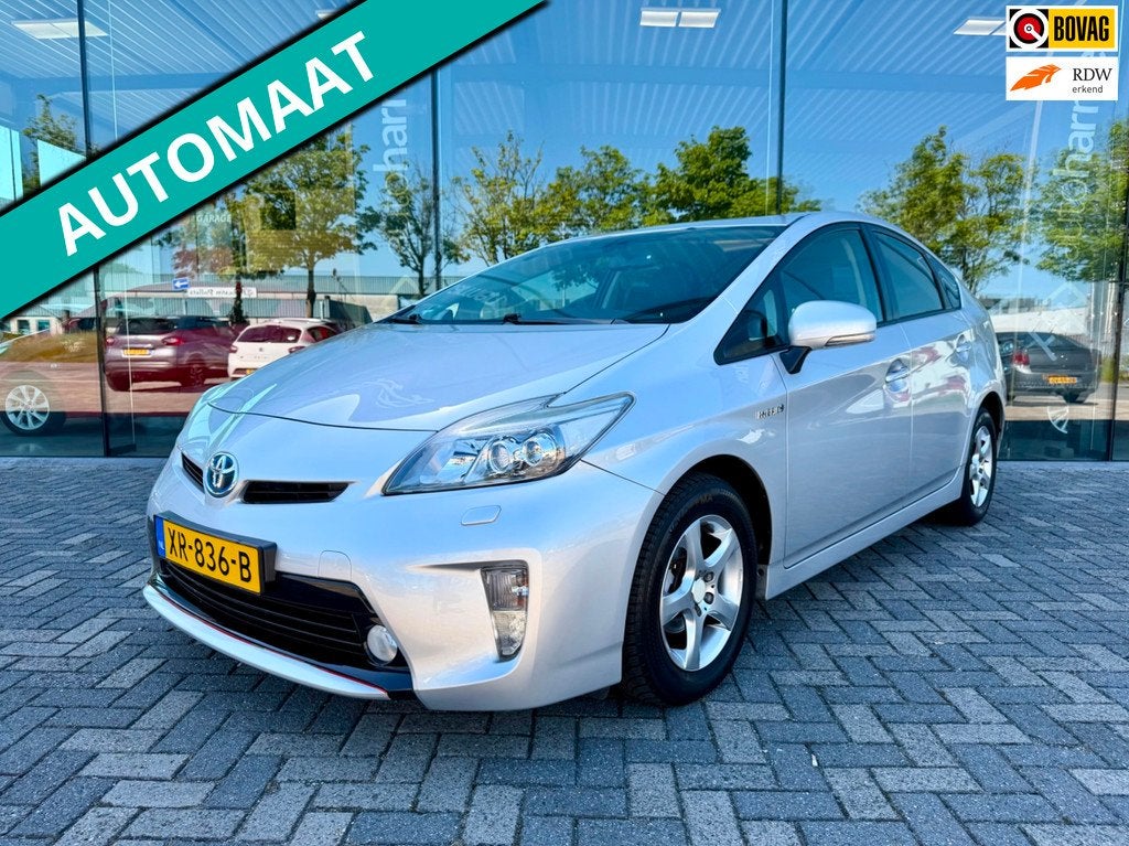 Toyota Prius 1.8 Hybrid 136pk automaat Dynamic Business deal, Auto's, Toyota, Euro 5, Gebruikt, Zwart, 4 cilinders