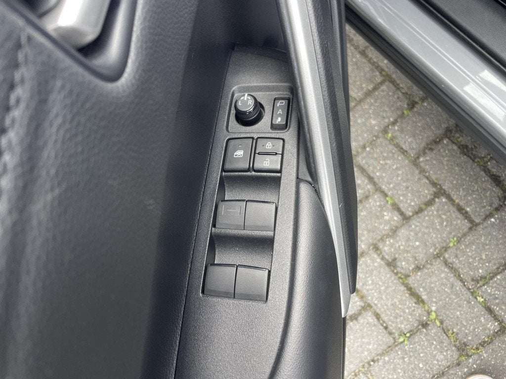 Toyota Corolla Cross Hybrid 140 Dynamic | Navigatie | Origin, Auto's, Stof, Gebruikt, 4 cilinders, Origineel Nederlands