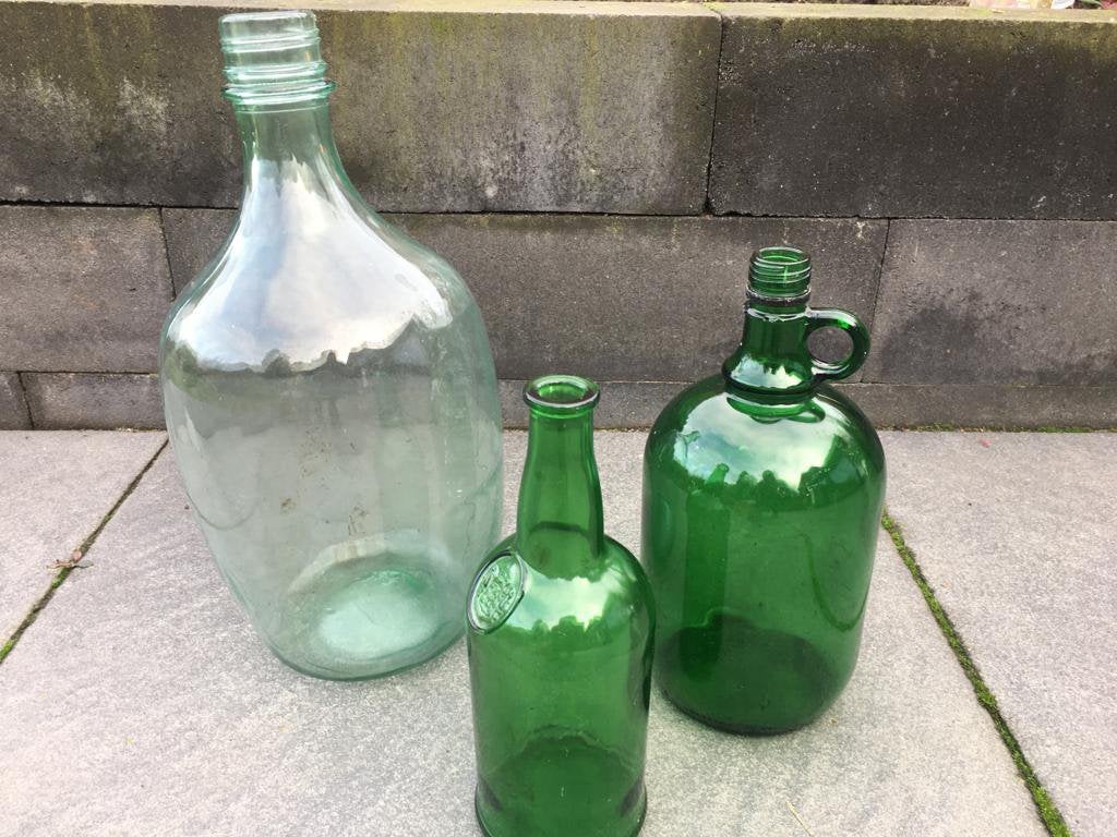 Groene vazen, Huis en Inrichting, Woonaccessoires | Stolpen, Glas, Ophalen, Gebruikt, Geschikt voor buiten