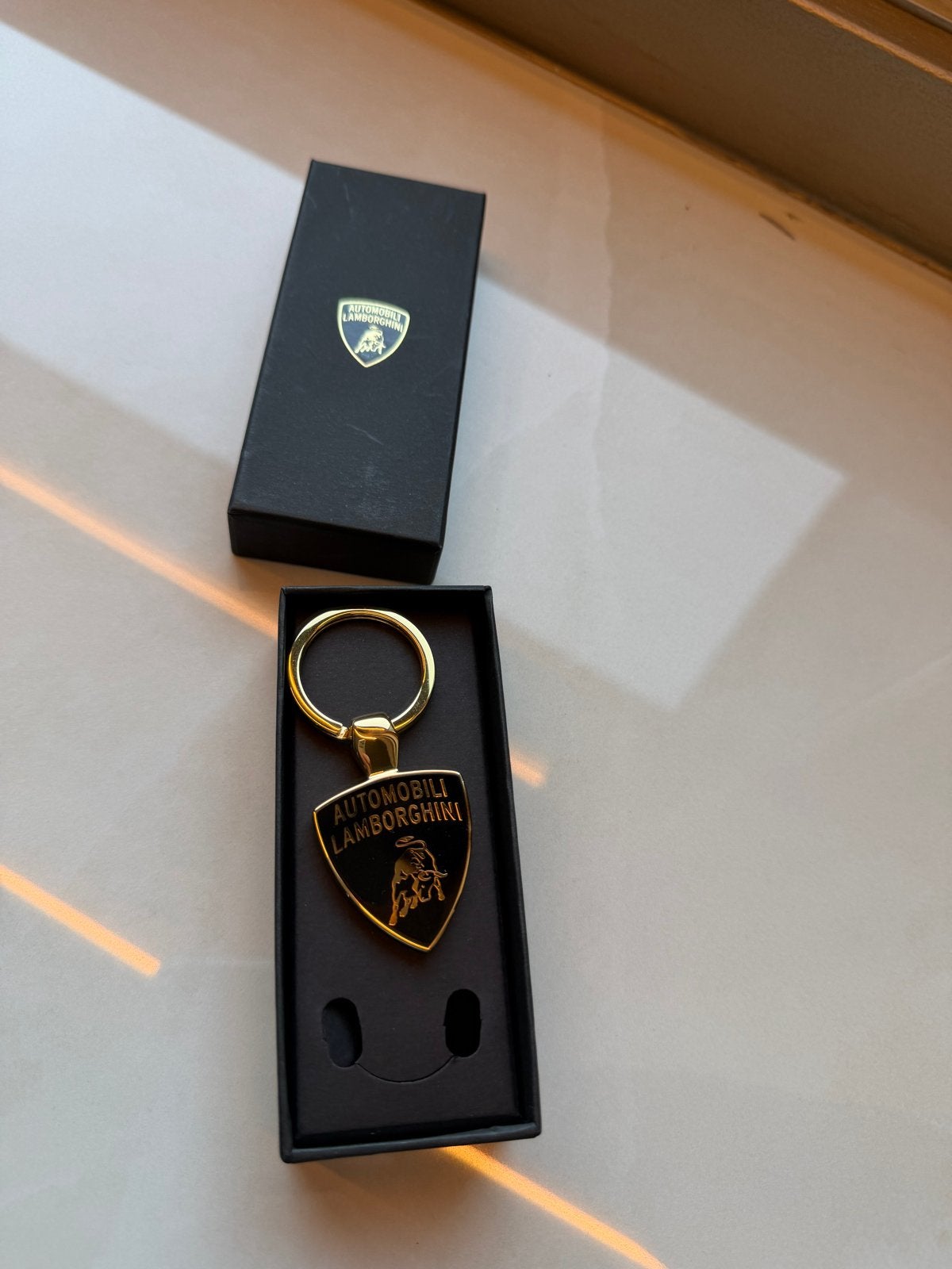 Originele Lamborghini Sleutelhanger - Nieuw in Doos, Ophalen of Verzenden, Nieuw, Merk