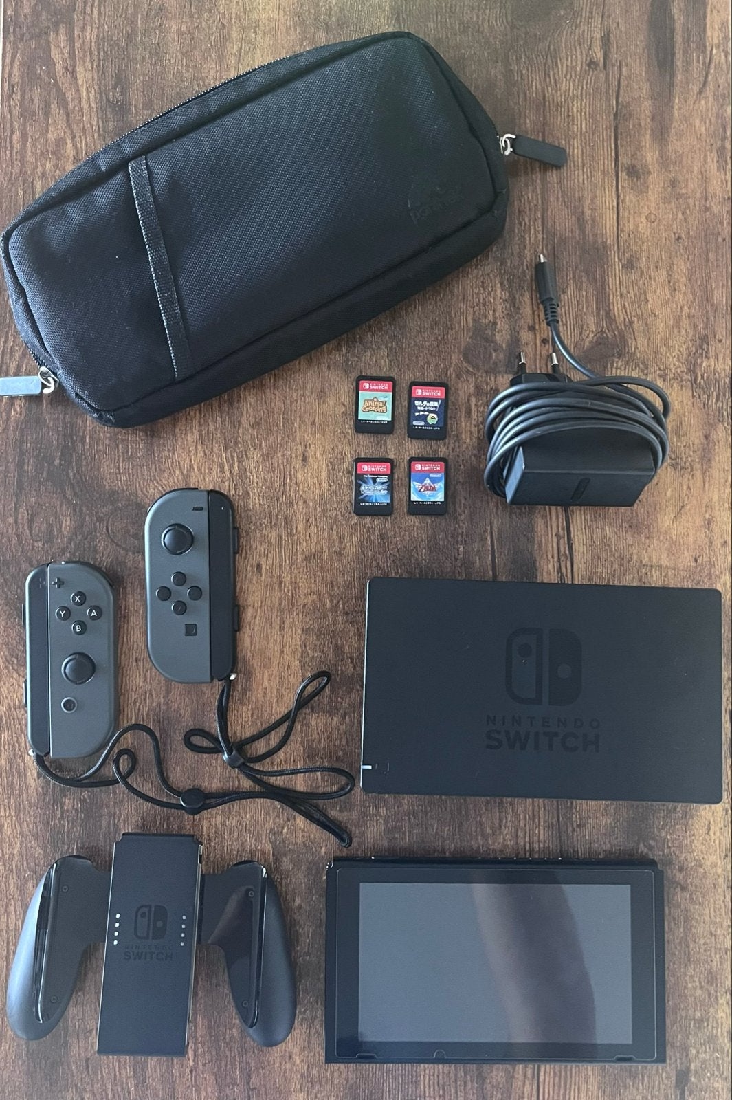 Nintendo Switch met accessoires en 4 games, Met 2 controllers, Ophalen of Verzenden, Switch Original, Gebruikt
