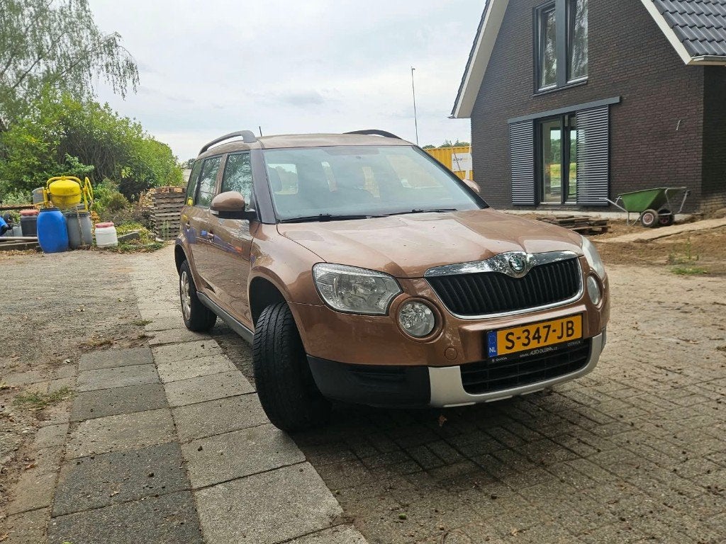Skoda Yeti 1.2TSI 2012, 15 km/l, Zwart, Bruin, Overige bekleding