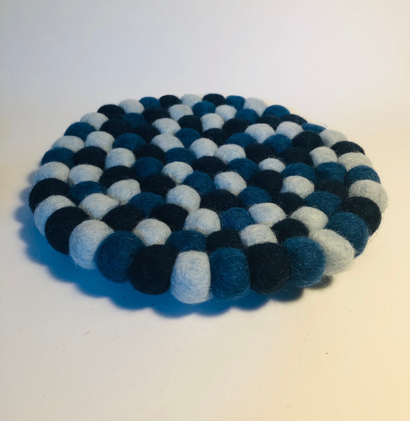 Vilten pannen onderzetter, licht- en donkerblauw, Ophalen of Verzenden, Zo goed als nieuw