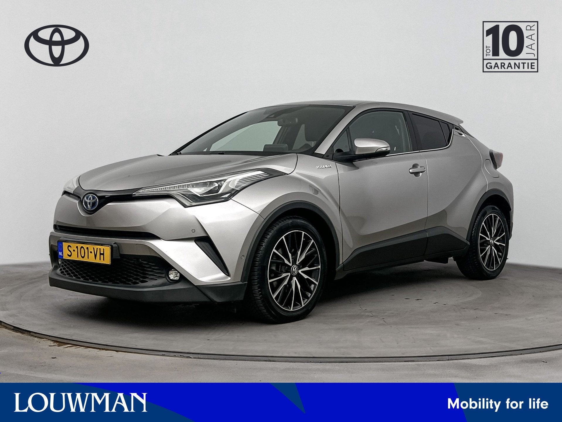Toyota C-HR 1.8 Hybrid Executive Limited | Lichtmetalen Velg, 12 maanden, 4 cilinders, Leder en Stof, 122 pk