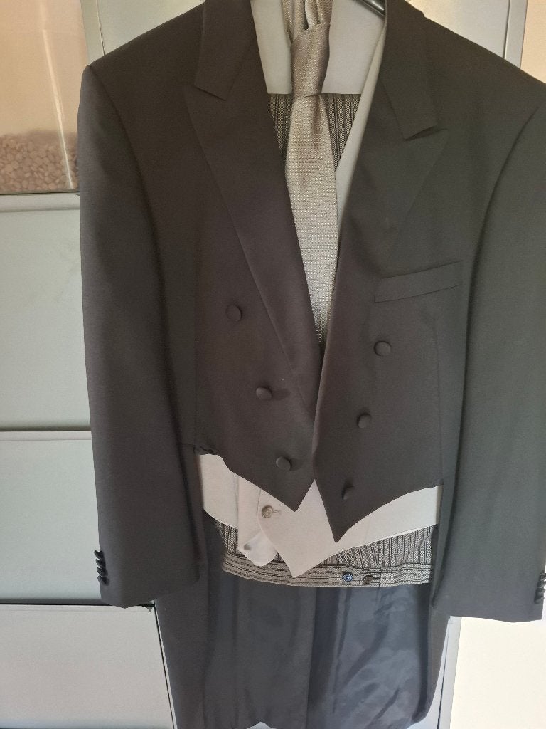 Mooie kostuums, Jacquet en slipjassen te koop, Ophalen of Verzenden, Zo goed als nieuw, Maat 52/54 (L), Grijs