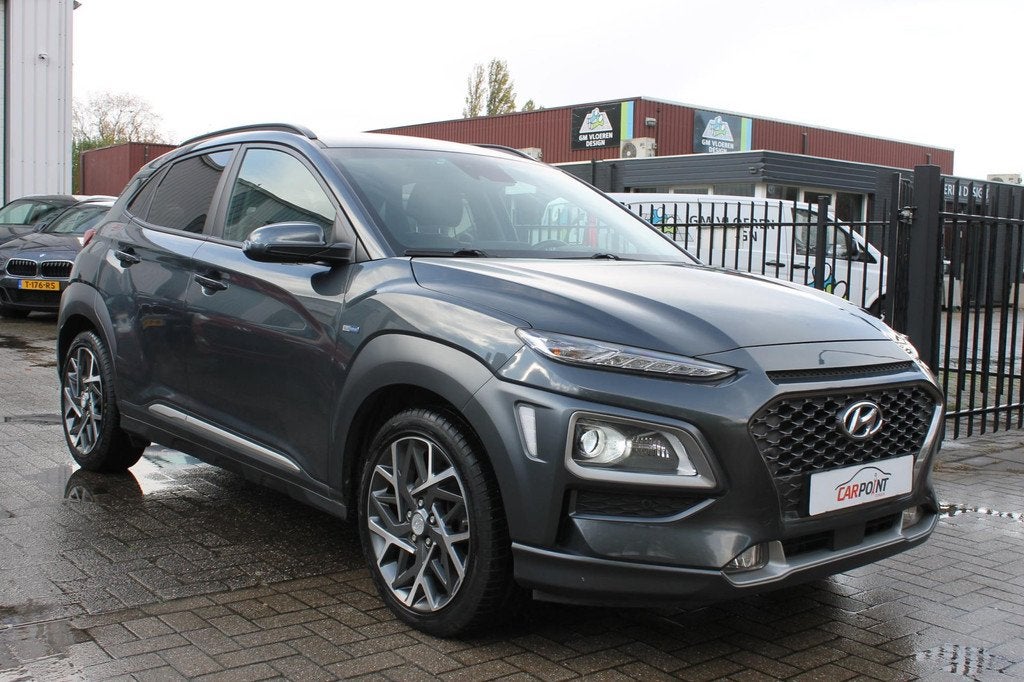 Hyundai Kona 1.6 GDI HEV Premium Leer Led Carplay Keyless HU, Auto's, Hyundai, Gebruikt, Zwart, Bedrijf, 19 km/l