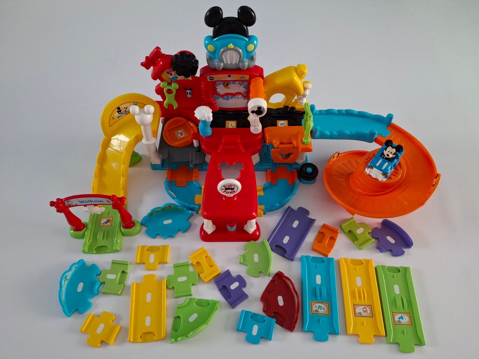 VTech Toet Toet Auto's Mickey Mouse Garage + extra baandelen, Ophalen of Verzenden, Zo goed als nieuw, 6 maanden tot 2 jaar