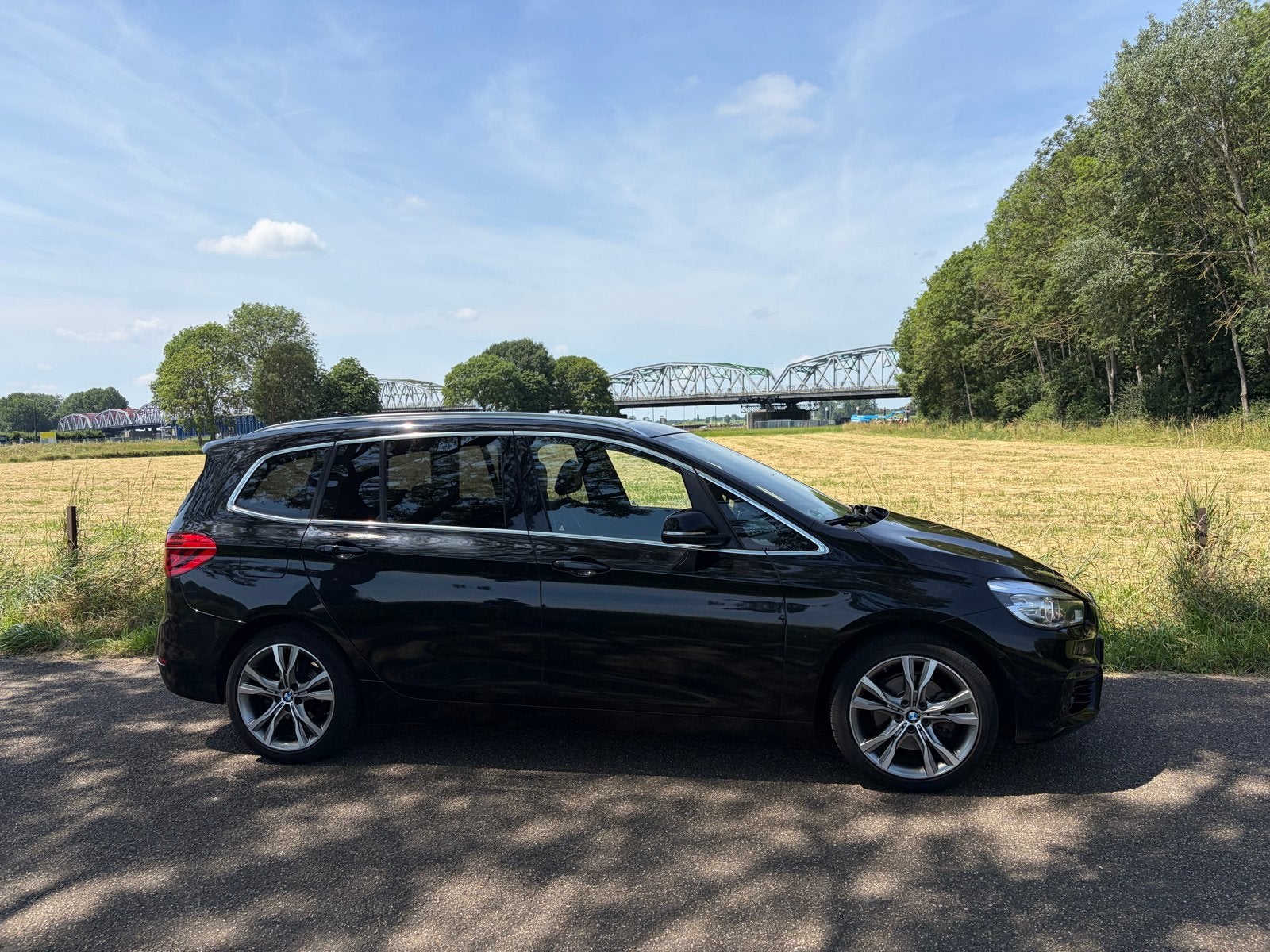 BMW 2-Serie Gran Tourer 1.5 218I AUT 2016 Zwart, Auto's, 136 pk, Zwart, 2-Serie Gran Tourer, Zwart
