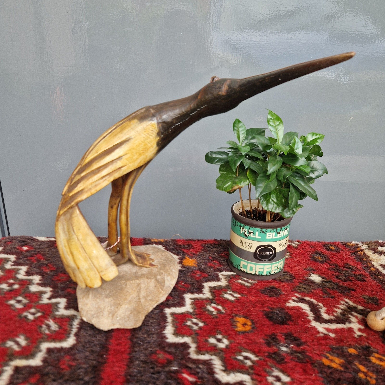 Vintage houten vogelbeeldje op steen, Ophalen