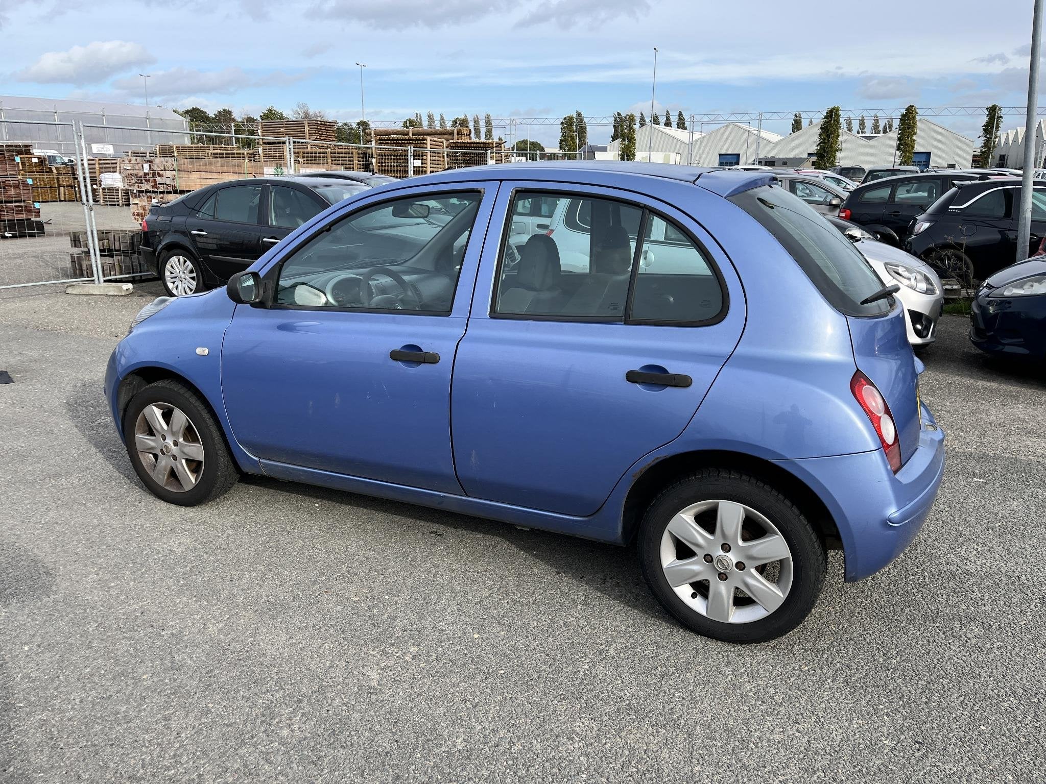 Nissan Micra 1.2 Visia Airco, stuurbekrachtiging, elektrisch, Stof, 4 cilinders, Blauw, Handgeschakeld