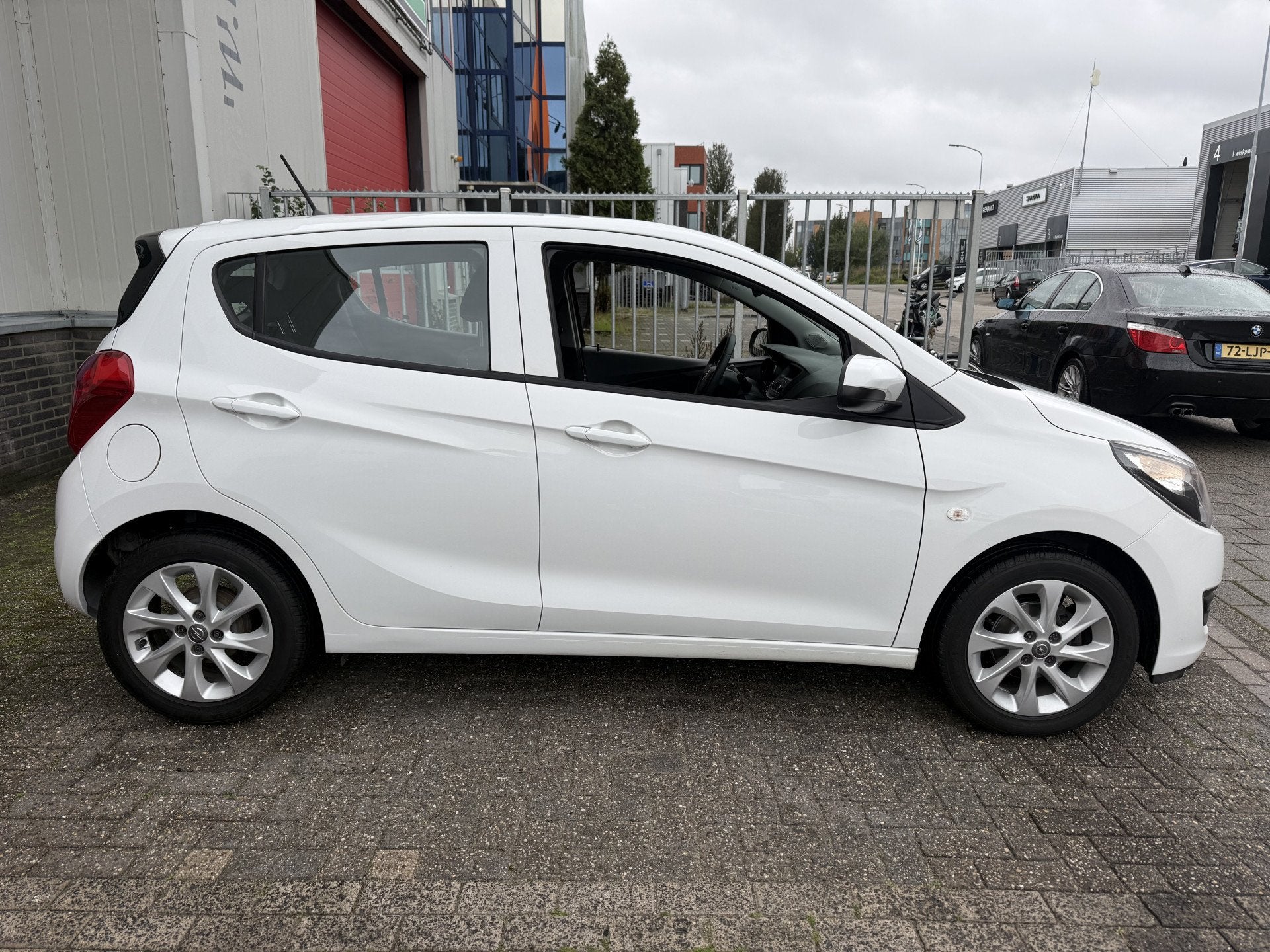 Opel KARL 1.0 ecoFLEX 120 Jaar Edition (bj 2019), Auto's, Stof, Gebruikt, Wit, Origineel Nederlands