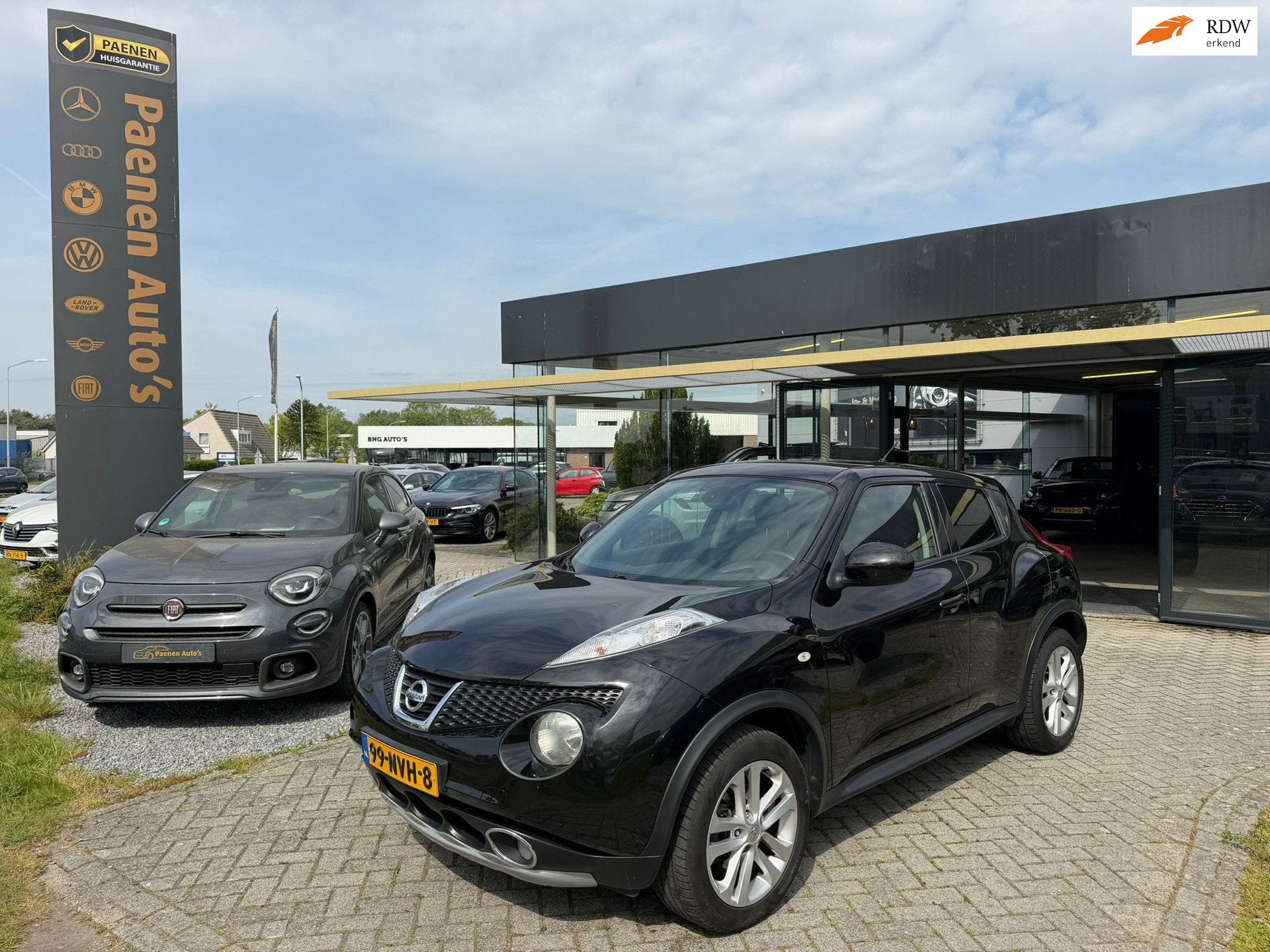 Nissan Juke 1.6 Tekna|Cam|T-haak|Leder, Auto's, Nissan, Euro 5, Zwart, 4 cilinders, Bedrijf