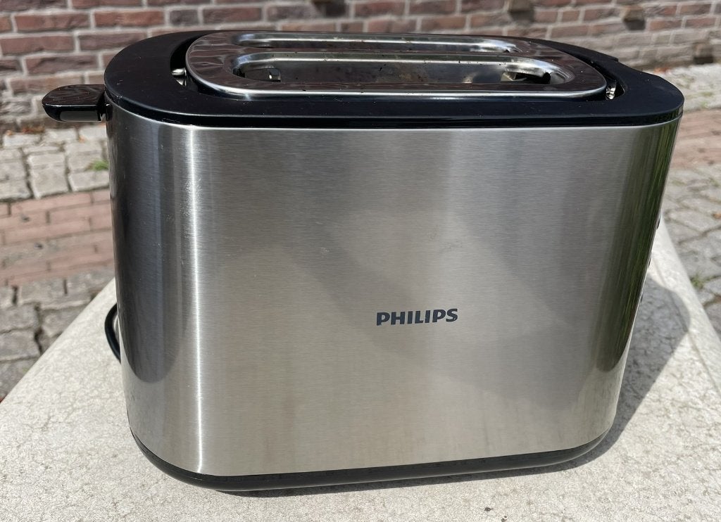 Metallic zilverkleurige Philips broodrooster, Ophalen of Verzenden, Refurbished, Uitneembare kruimellade