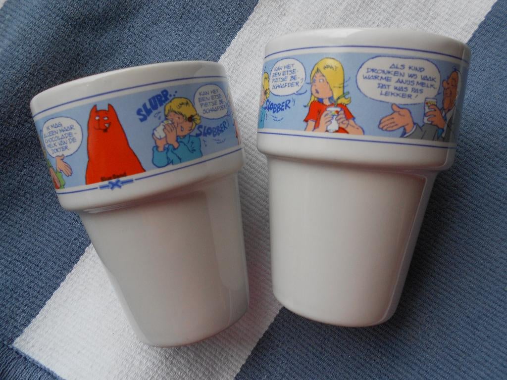 2 melk bekers Jan Jans en de kinderen Blue Band, Huis en Inrichting, Keuken | Servies, Gebruikt, Overige typen, Overige stijlen