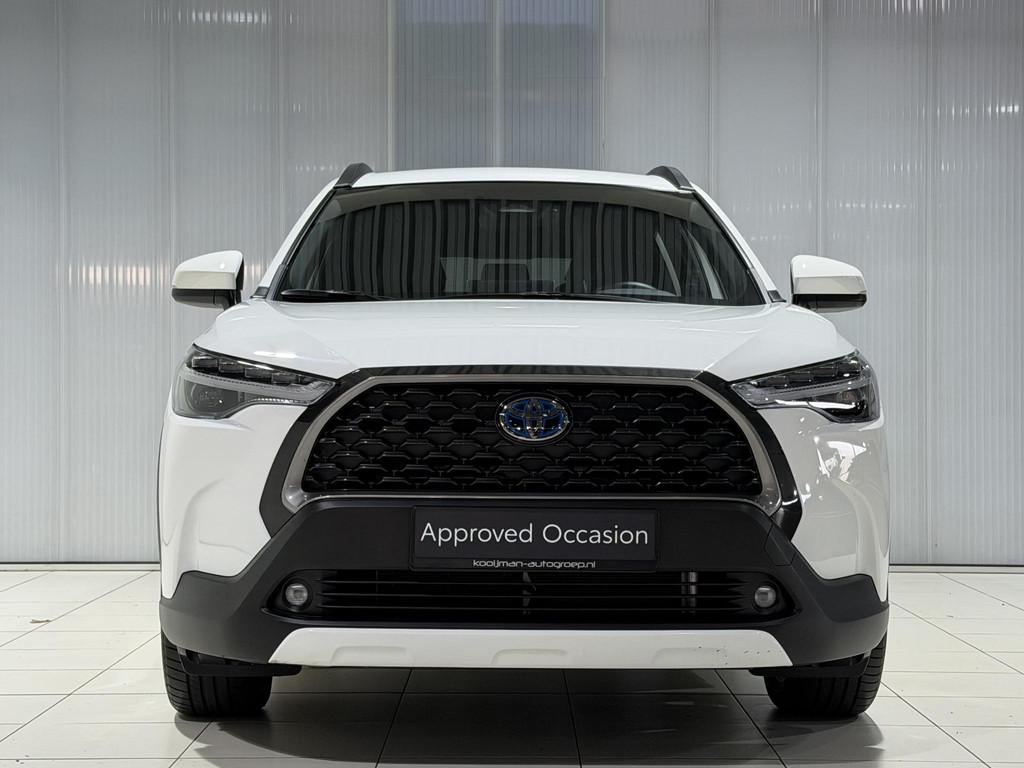 Toyota Corolla Cross Hybrid 140 Dynamic | Elektrische achter, Stof, Gebruikt, 4 cilinders, Wit