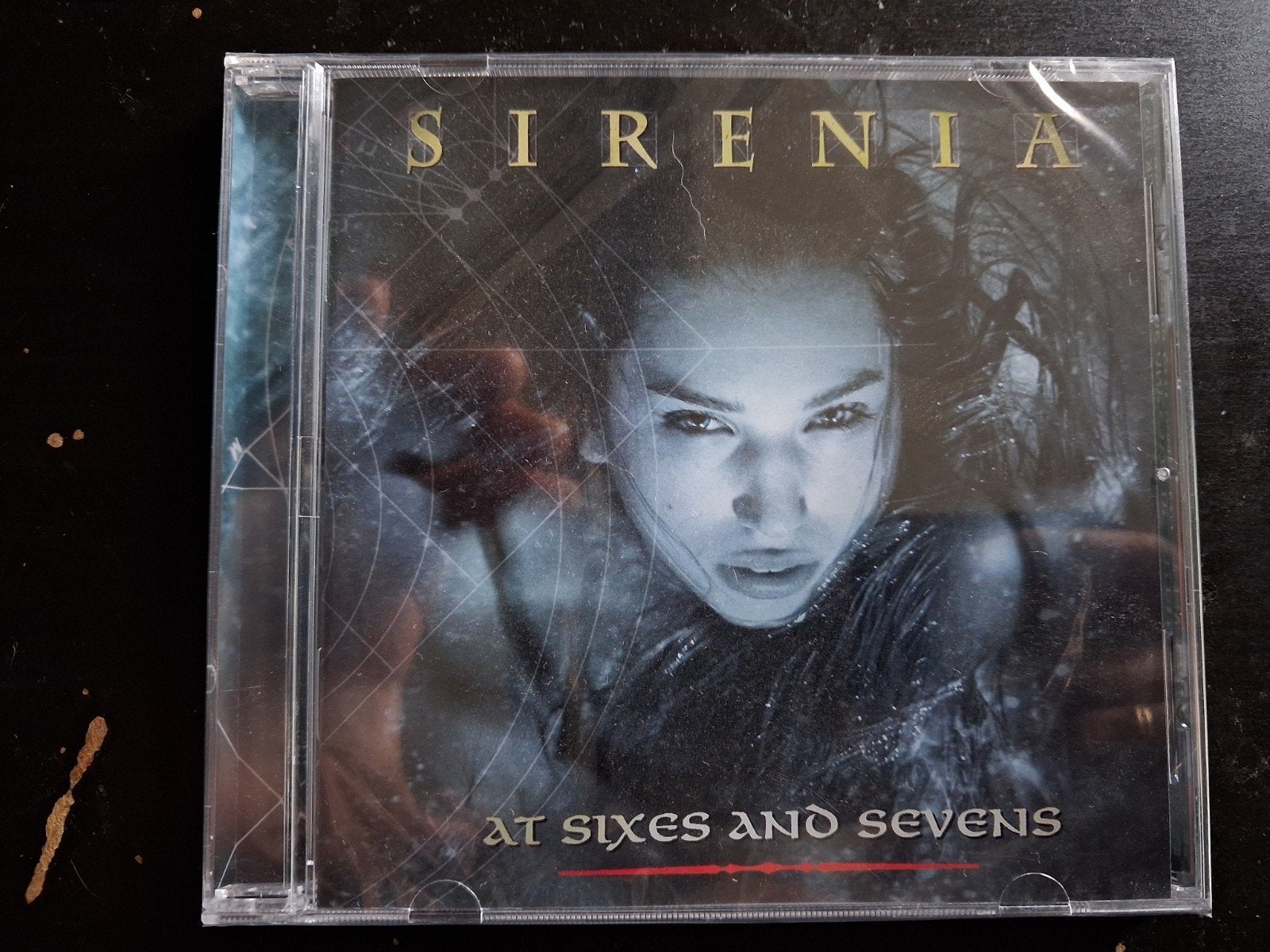 Sirenia - At Sixes and Sevens CD (Nieuw in verpakking), Overige genres, Ophalen of Verzenden, Nieuw in verpakking, Inclusief doosje