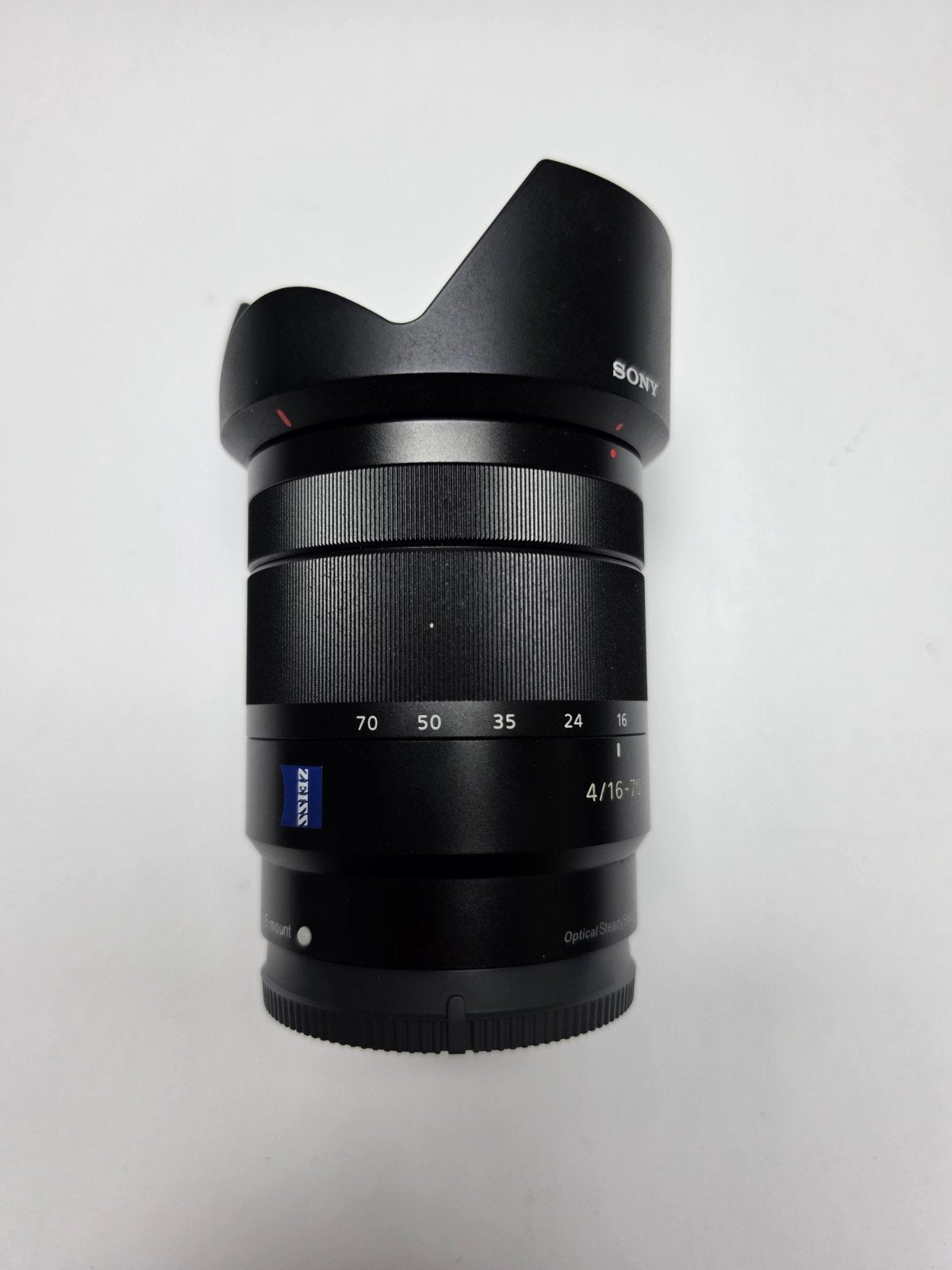 Sony Vario-Tessar T* E 16-70mm F4 ZA OSS Zeiss Lens, Audio, Tv en Foto, Fotografie | Lenzen en Objectieven, Ophalen of Verzenden