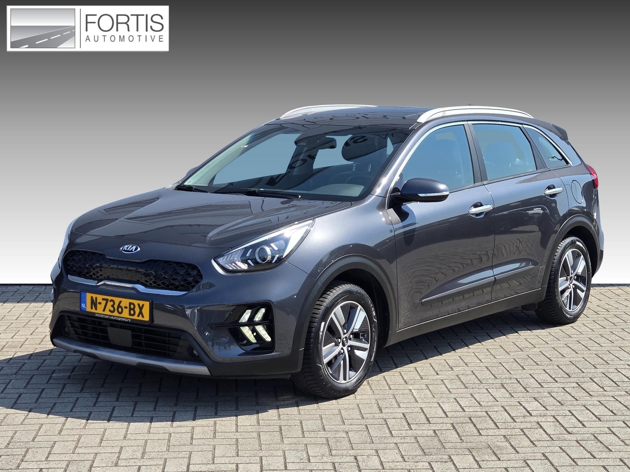 Kia Niro 1.6 GDi Hybrid DynamicLine NL-AUTO |TREKHAAK | NAVI, Auto's, Gebruikt, Euro 6, 2 kWh, Leder en Stof