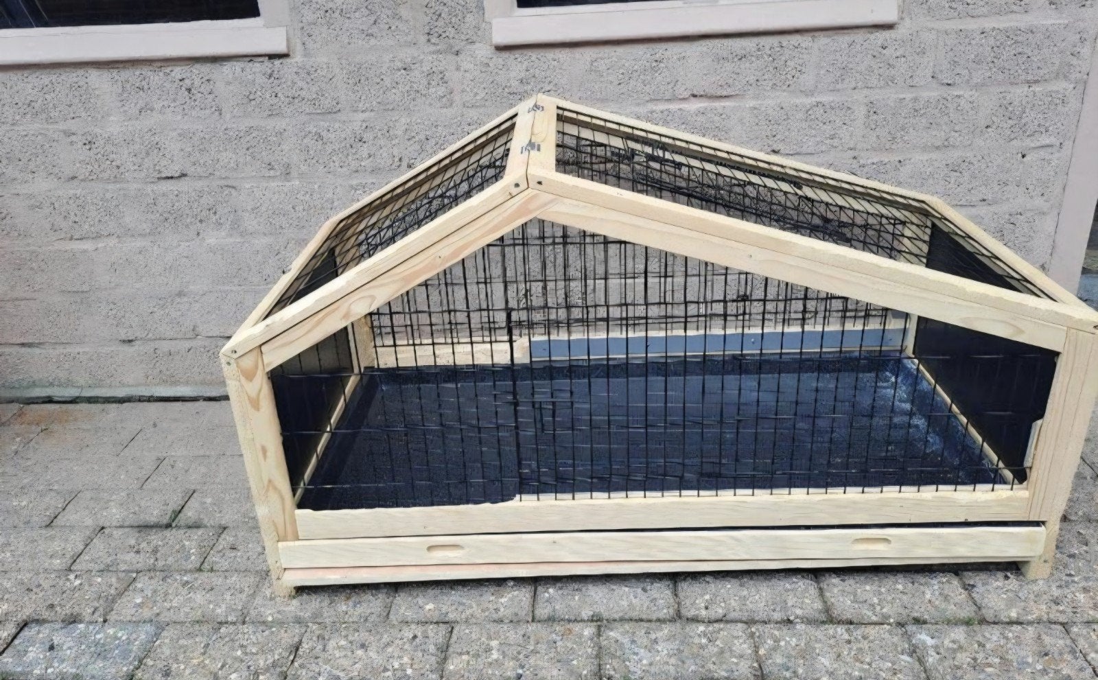 Houten knaagdieren kooi, Ophalen