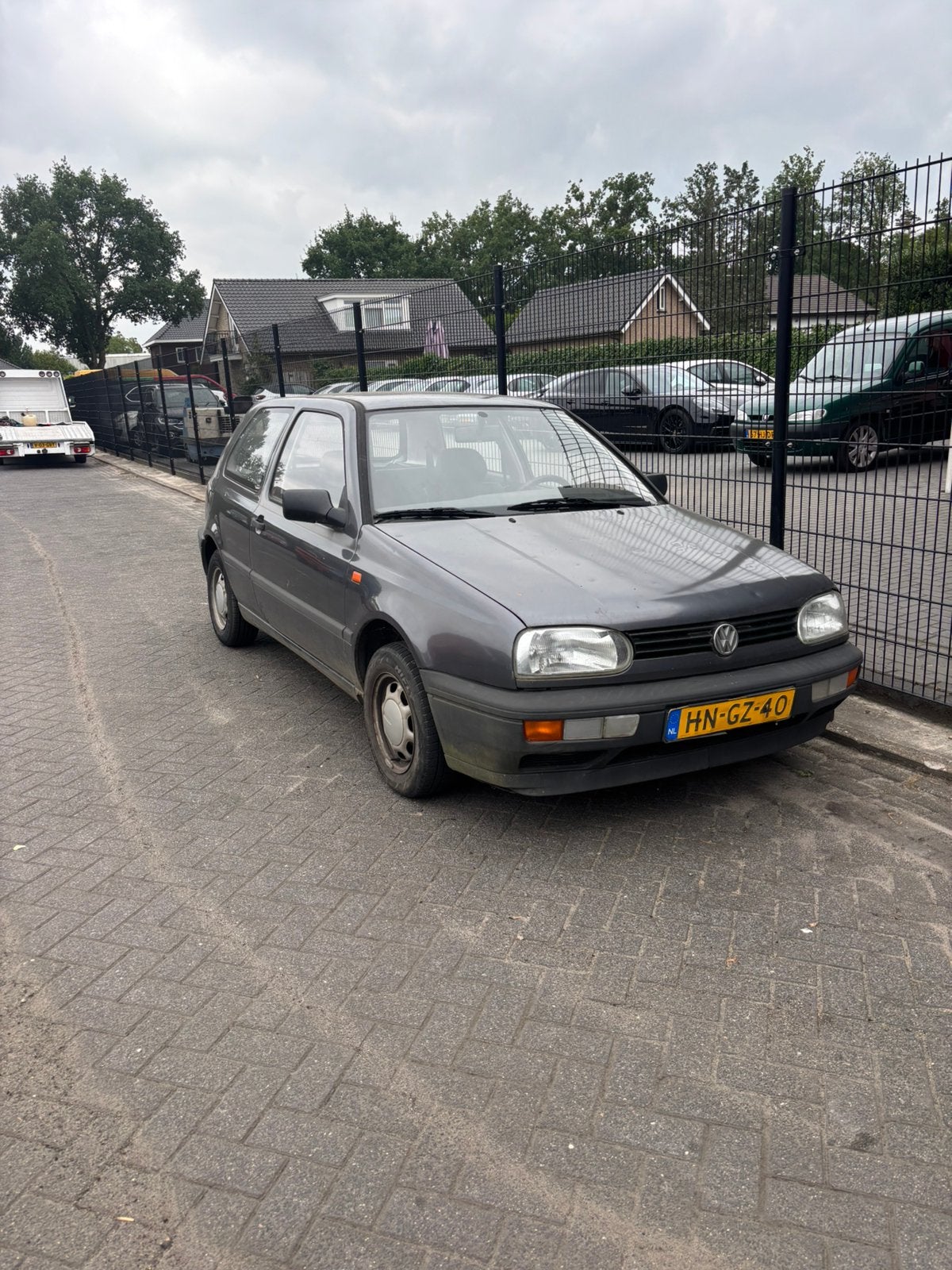 Volkswagen Golf 1.8 CL 66KW AUT E2 1994 Grijs, Auto's, Stof, Zwart, 4 cilinders, Origineel Nederlands