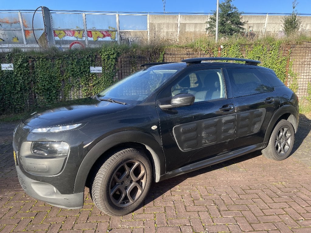Citroën C4 Cactus Puretech 82pk 2016 Zwart, Auto's, Voorwielaandrijving, Parkeersensor, Stof, 1199 cc